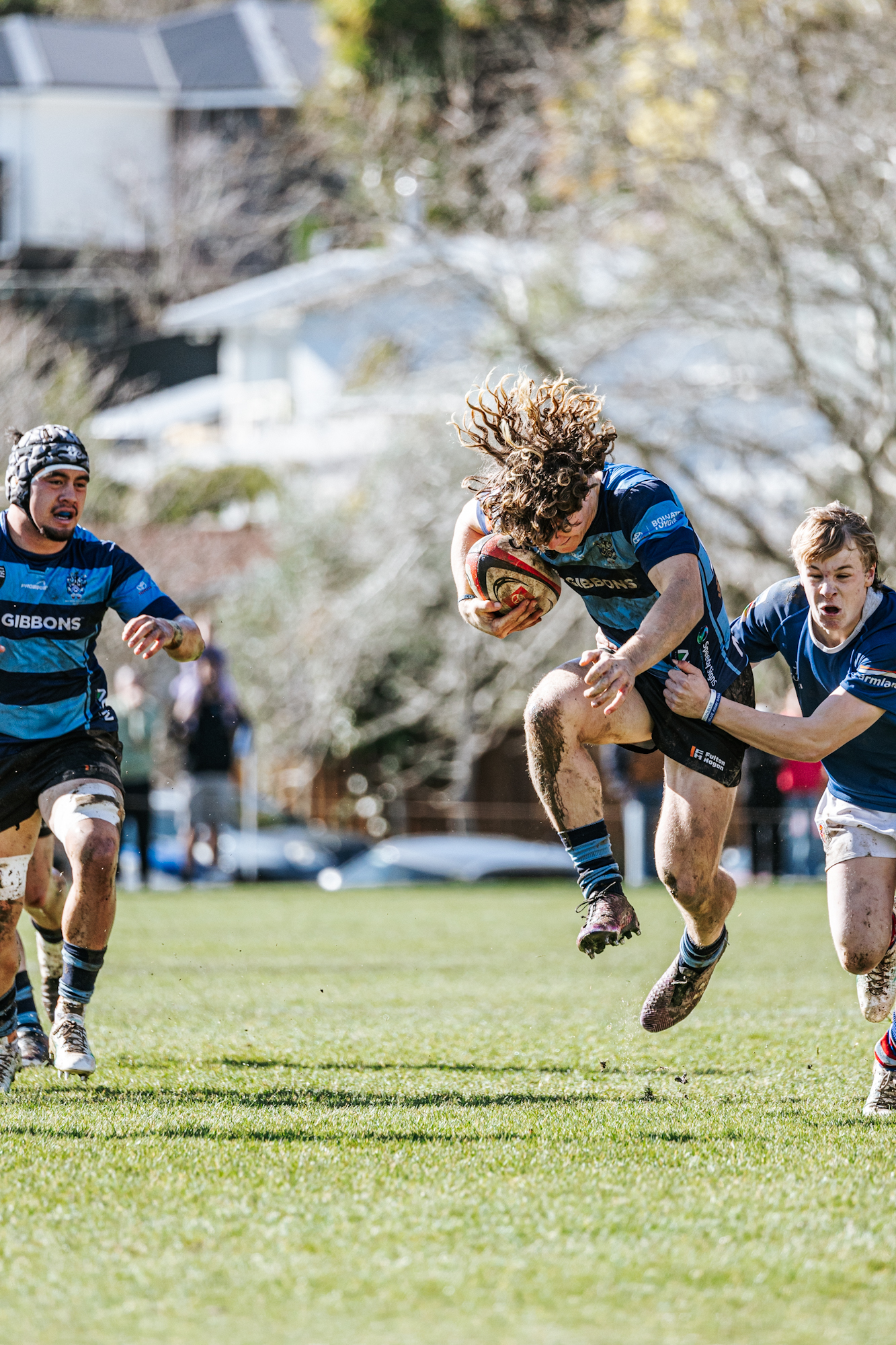 The trademark curly mullet of Nelson College playmaker Harry Inch. Photo / Tasman Rugby Union