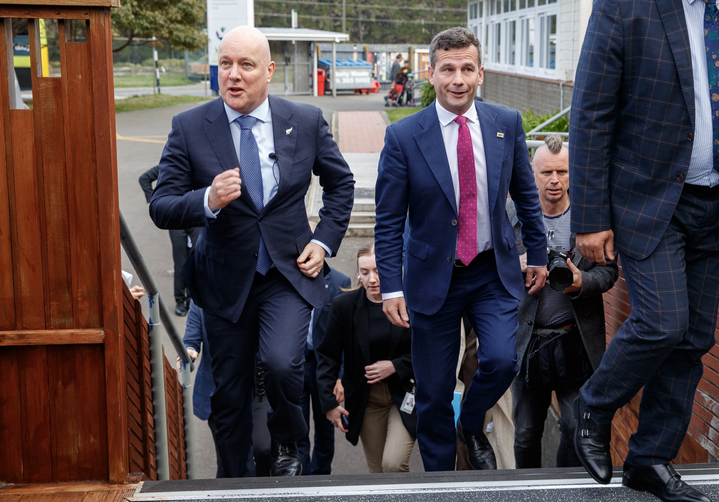 Prime Minister Christopher Luxon and Associate Education Minister David Seymour skip to class at Cardinal McKeefry School in Wellington on Tuesday. Photo / Mark Mitchell  