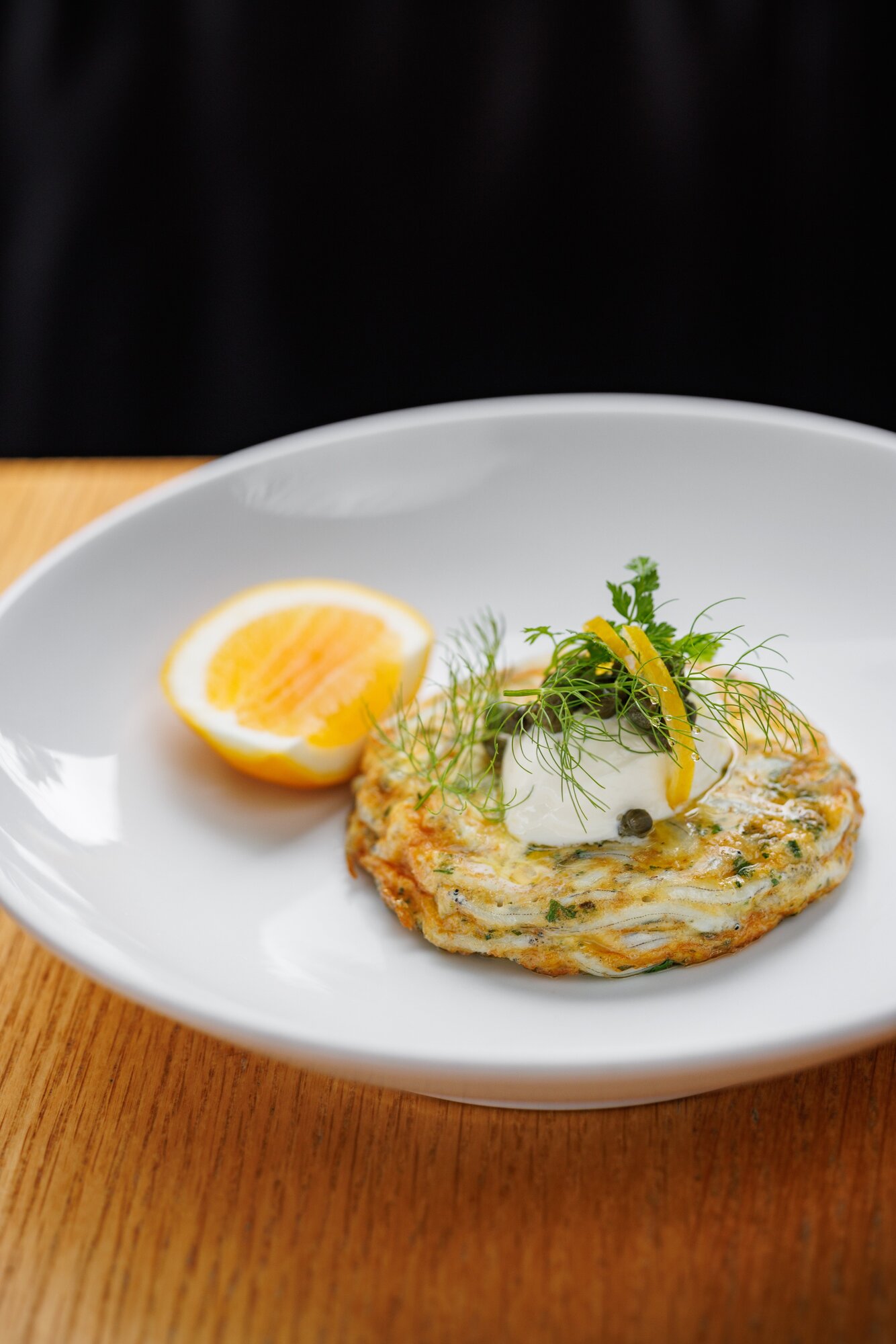 The Engine Room's whitebait fritter. Photo / Babiche Martens