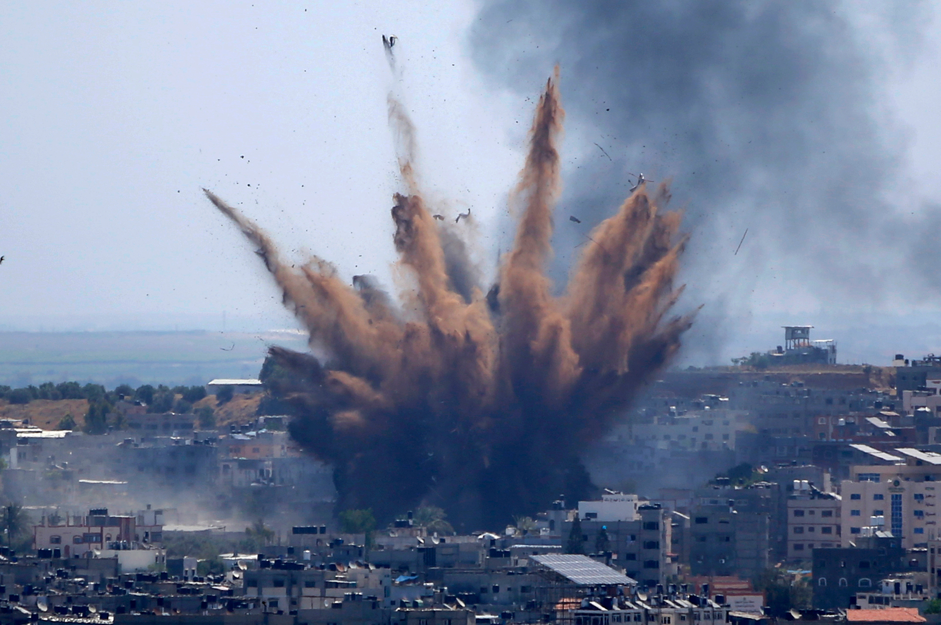 Smoke rises following Israeli airstrikes on a building in Gaza City. Photo / AP