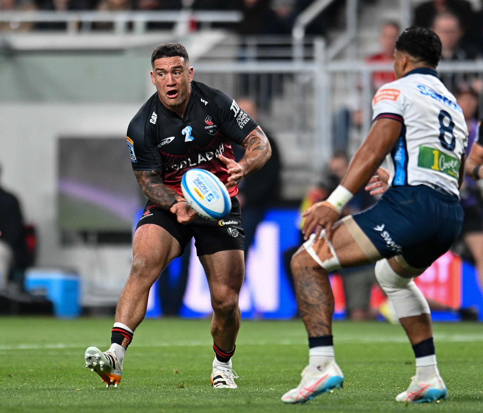 Crusaders hooker Codie Taylor looks to offload the ball against the Waratahs. Photo / Photosport