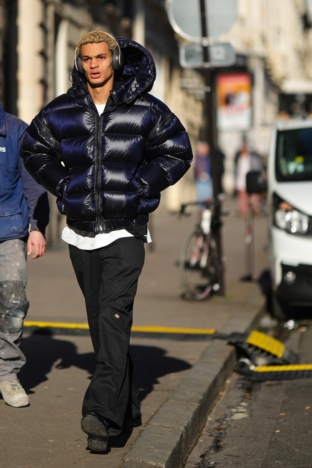 A guest wears over-ear headphones during the Paris Fashion Week menswear shows. Photo / Getty Images