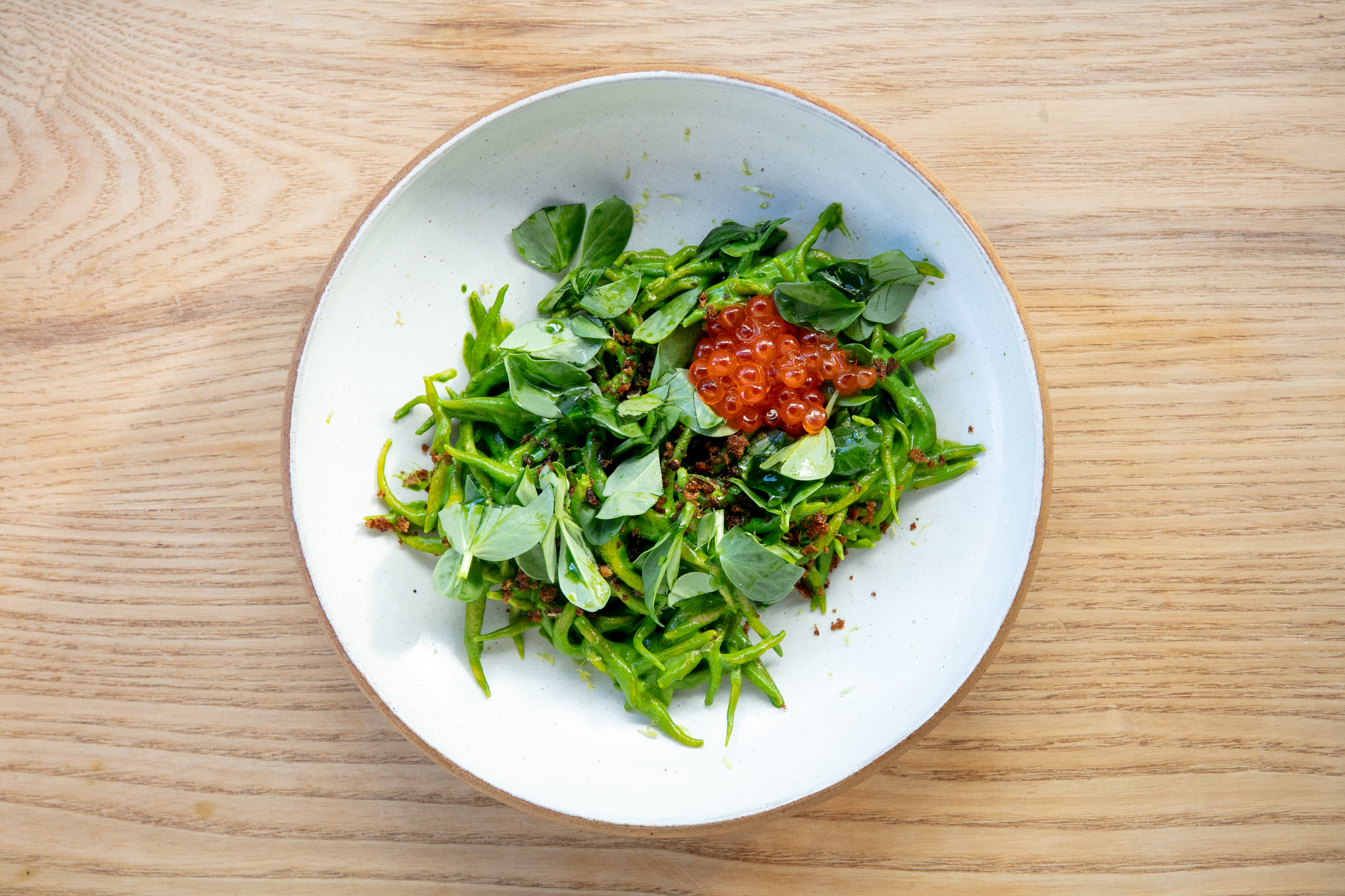 Handrolled green trofie with roe. Photo / Babiche Martens