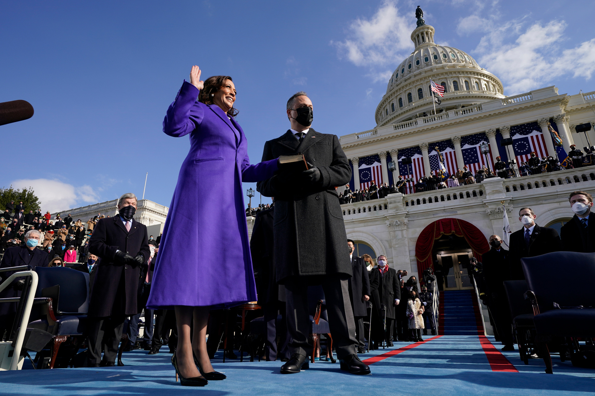 Kamala Harris is sworn in as Vice President, as her husband Doug Emhoff holds the Bible during the 59th Presidential Inauguration at the U.S. Capitol in Washington. Photo / AP