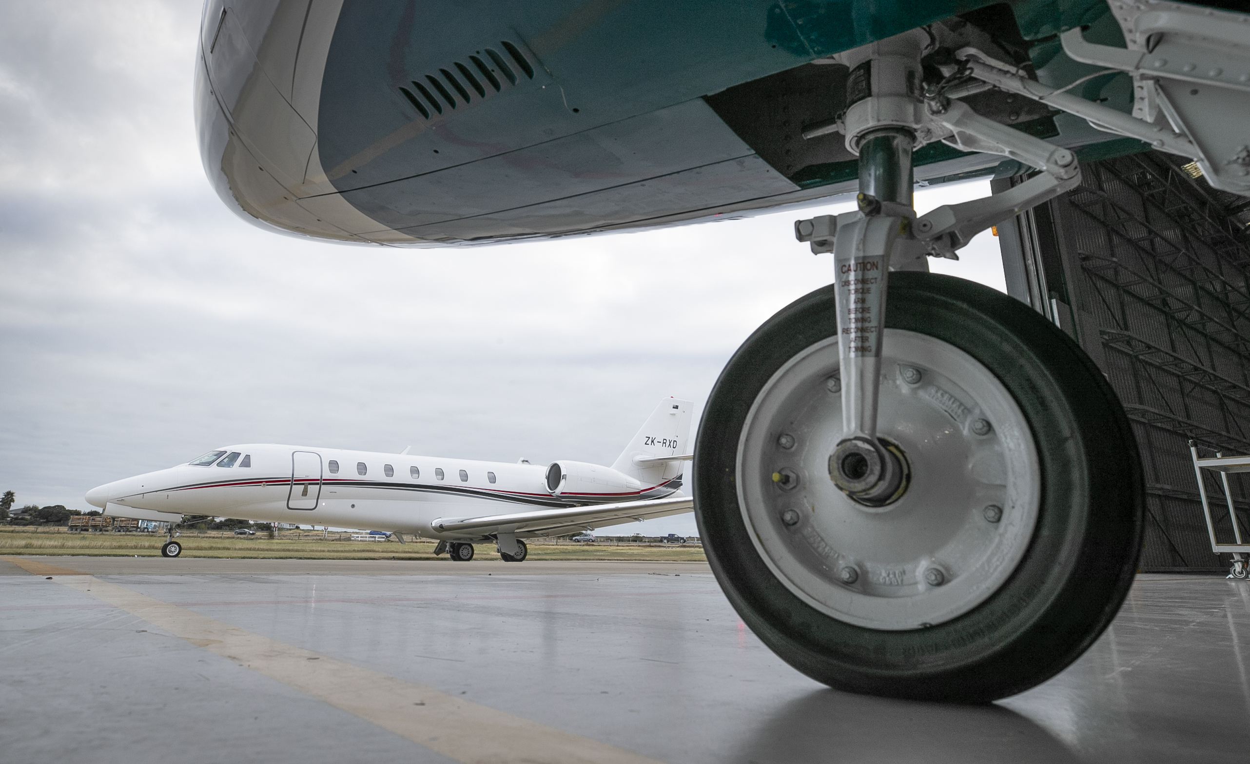 Two carriers at Hawke's Bay Airport have been granted a special Customs clearance that allows them to operate international flights with restrictions. Pictured are vehicles used by Jet Charters NZ/ NZ Air Ambulance Service. Photo / Warren Buckland