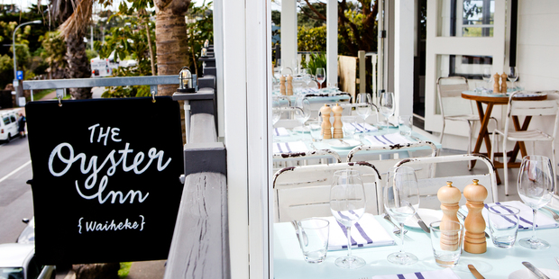 The Oyster Inn's verandah is the perfect spot to enjoy some bistro dishes. Photo / Babiche Martens