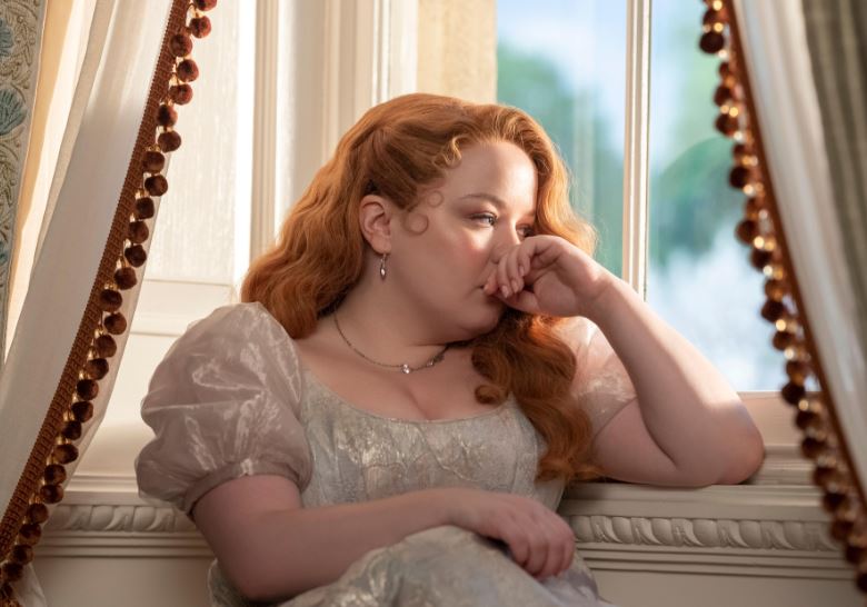 One of the first images of Bridgerton's new season shows Penelope (Nicola Coughlan), who is expected to finally become romantically involved with Colin Bridgerton. Photo / Netflix
