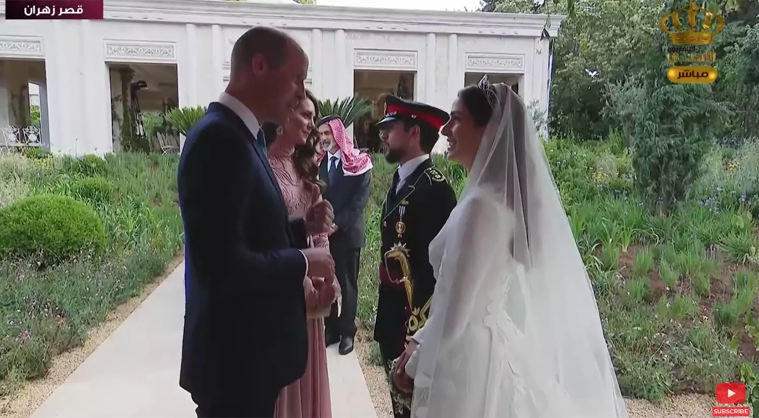 Footage has surfaced of William and Kate as guests at the royal wedding in Jordan, sharing a candid moment almost all couples would relate to. Photo / YouTube