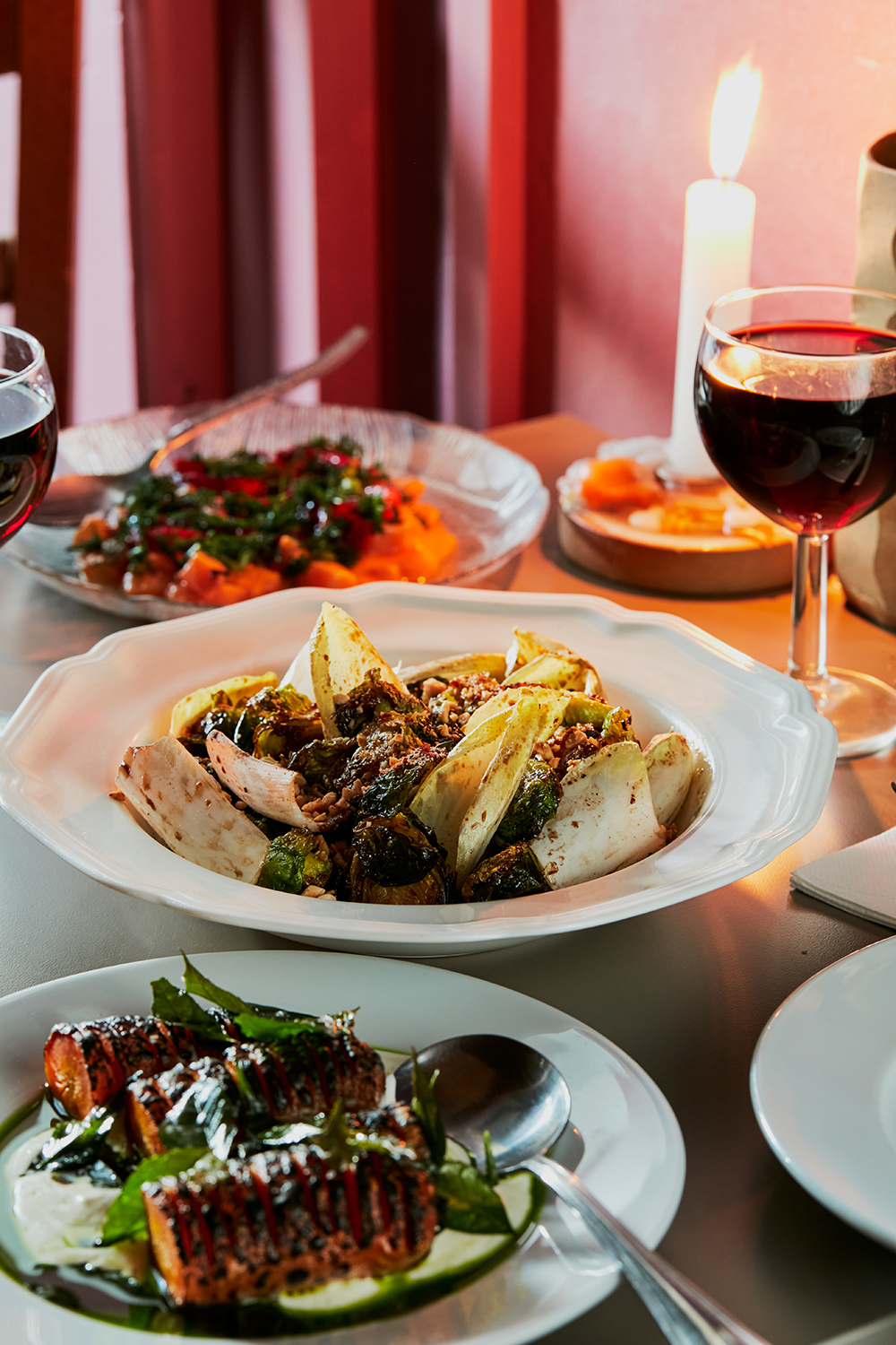 Brussels sprouts with radicchio, honey mustard and hazelnuts, and hasselback carrots with yoghurt and curry leaves on the menu at Roses on Karangahape Rd. Photo / Babiche Martens