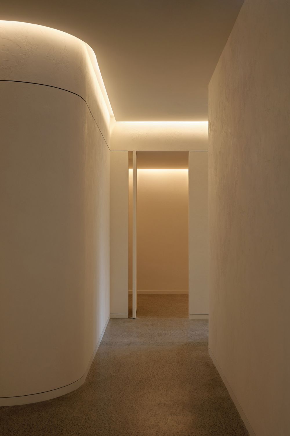 Pathway to heaven? Hana Parnell highlights curved walls in plastered finishes. Photo / Hamish Melville