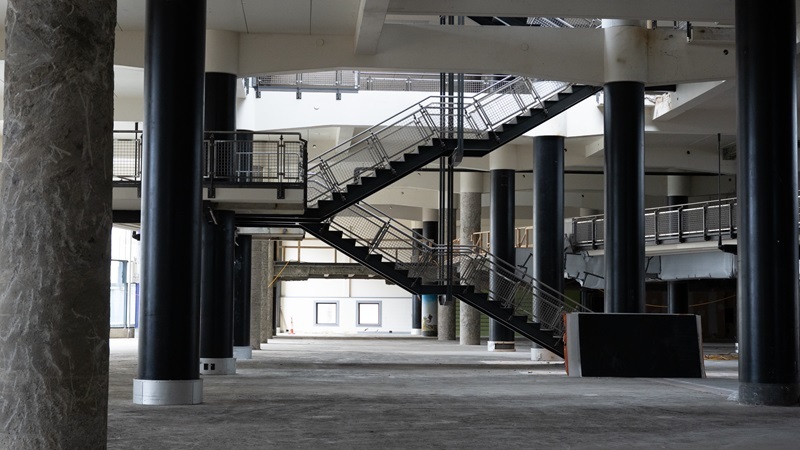 The central stairway on the ground floor. Photo / Supplied