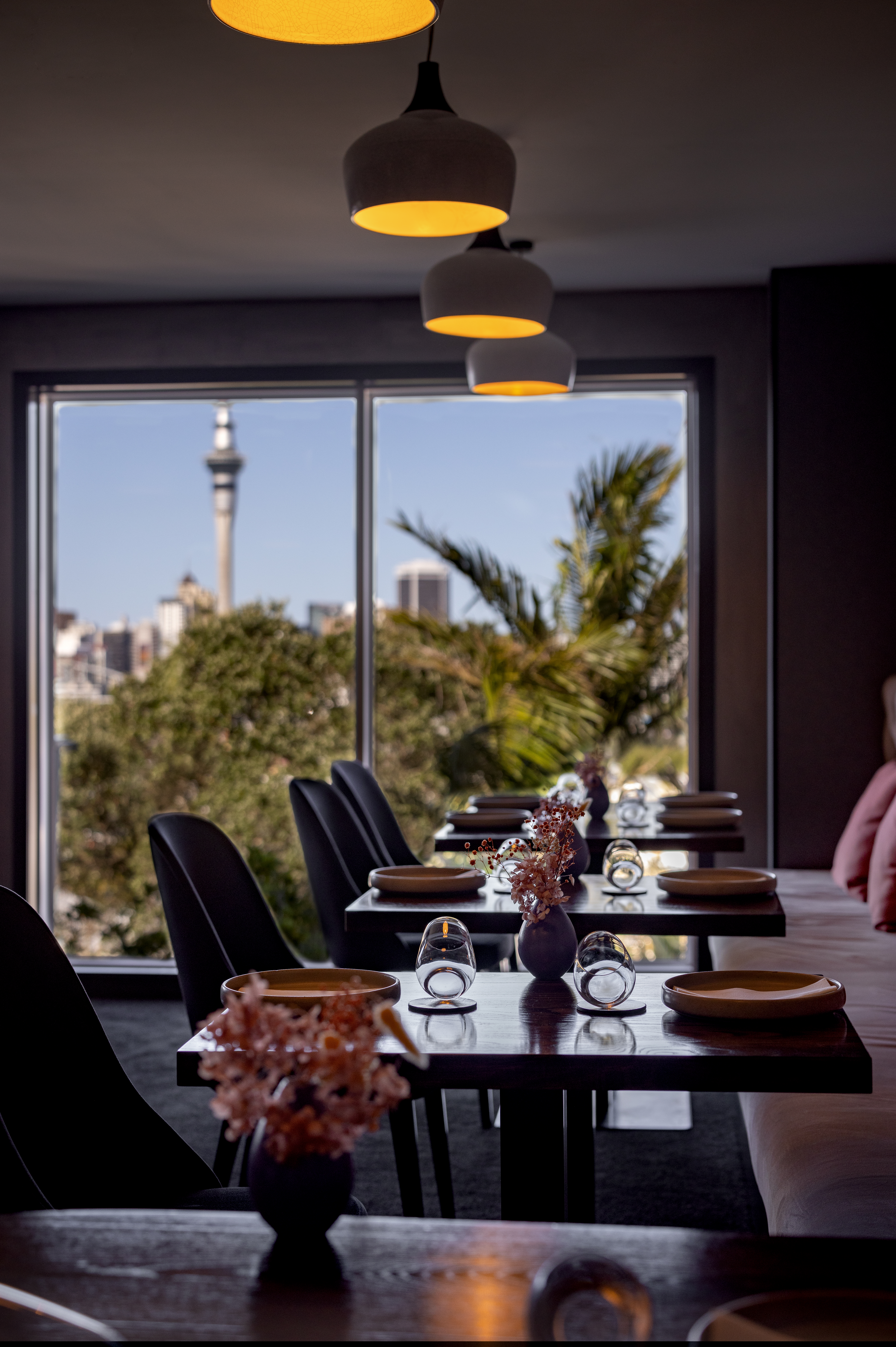 The upmarket dining room has stunning views of Auckland's city centre. Photo / Babiche Martens
