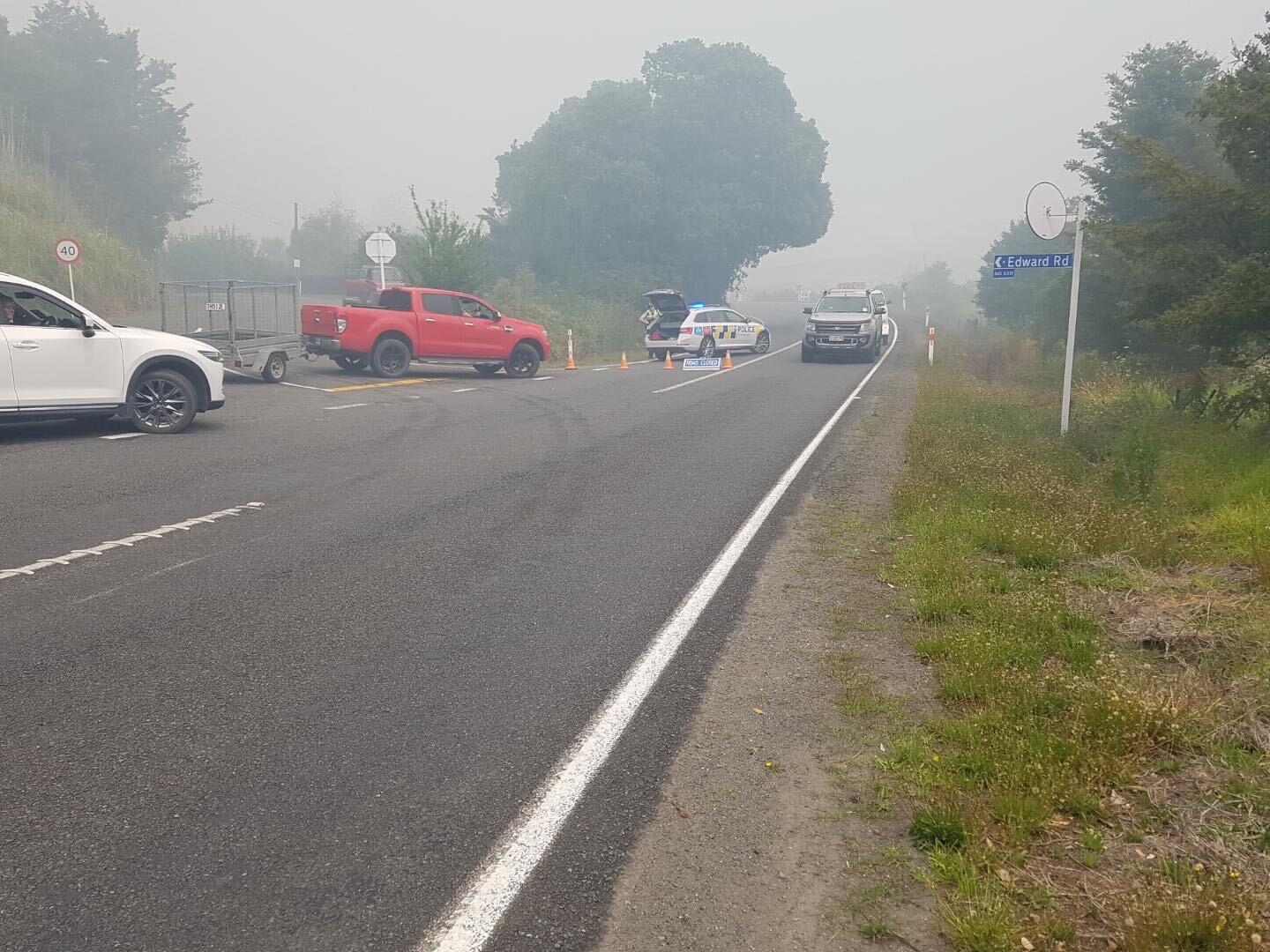 A large vegetation fire broke out on Whangārei Heads Rd between Onerahi and Tamaterau. Photo / Karina Cooper