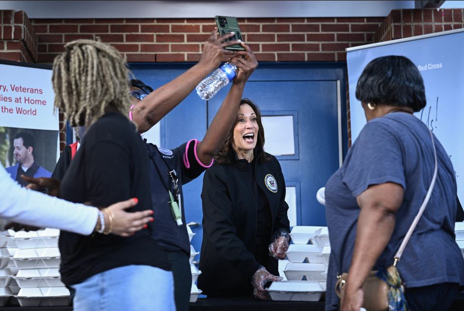 US Vice President Kamala Harris greets people as she hands out food at the Henry Brigham Community Center in Augusta, Georgia. Photo / AFP