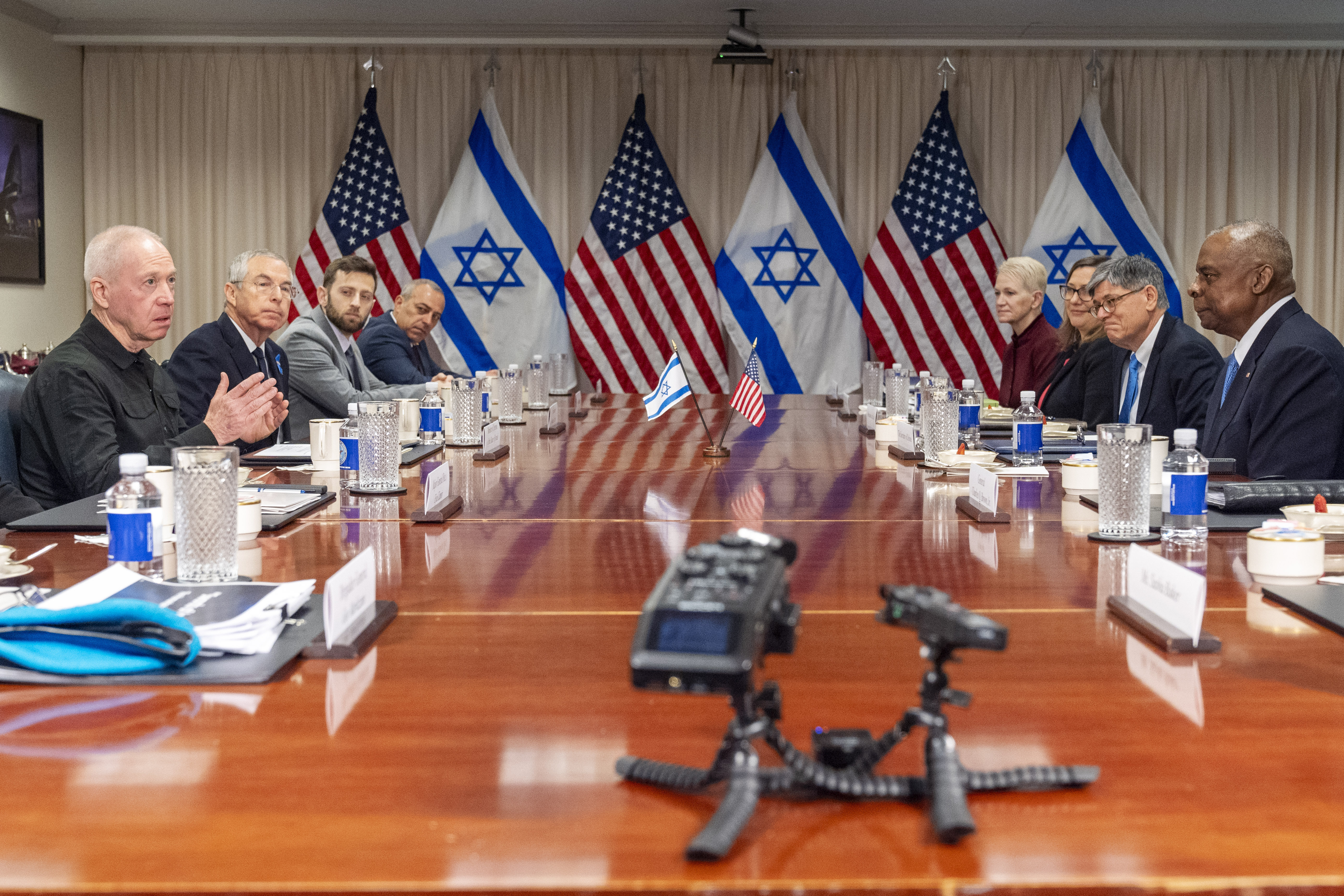 Israeli Defence Minister Yoav Gallant, at far left, speaks while meeting with US Defence Secretary Lloyd Austin, across the table at far right, at the Pentagon, Tuesday. Photo / AP