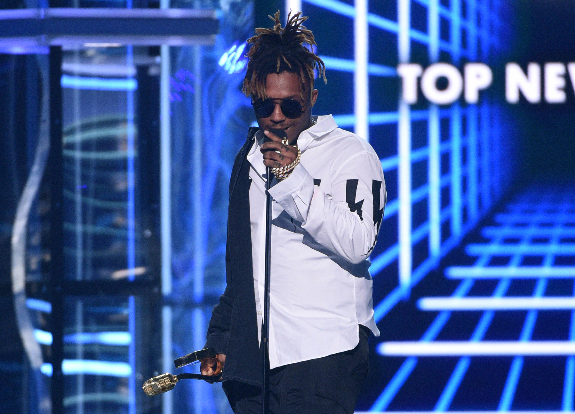 Report: Police say rapper Juice Wrld swallowed Percocet before suffering  seizure at Chicago airport and dying