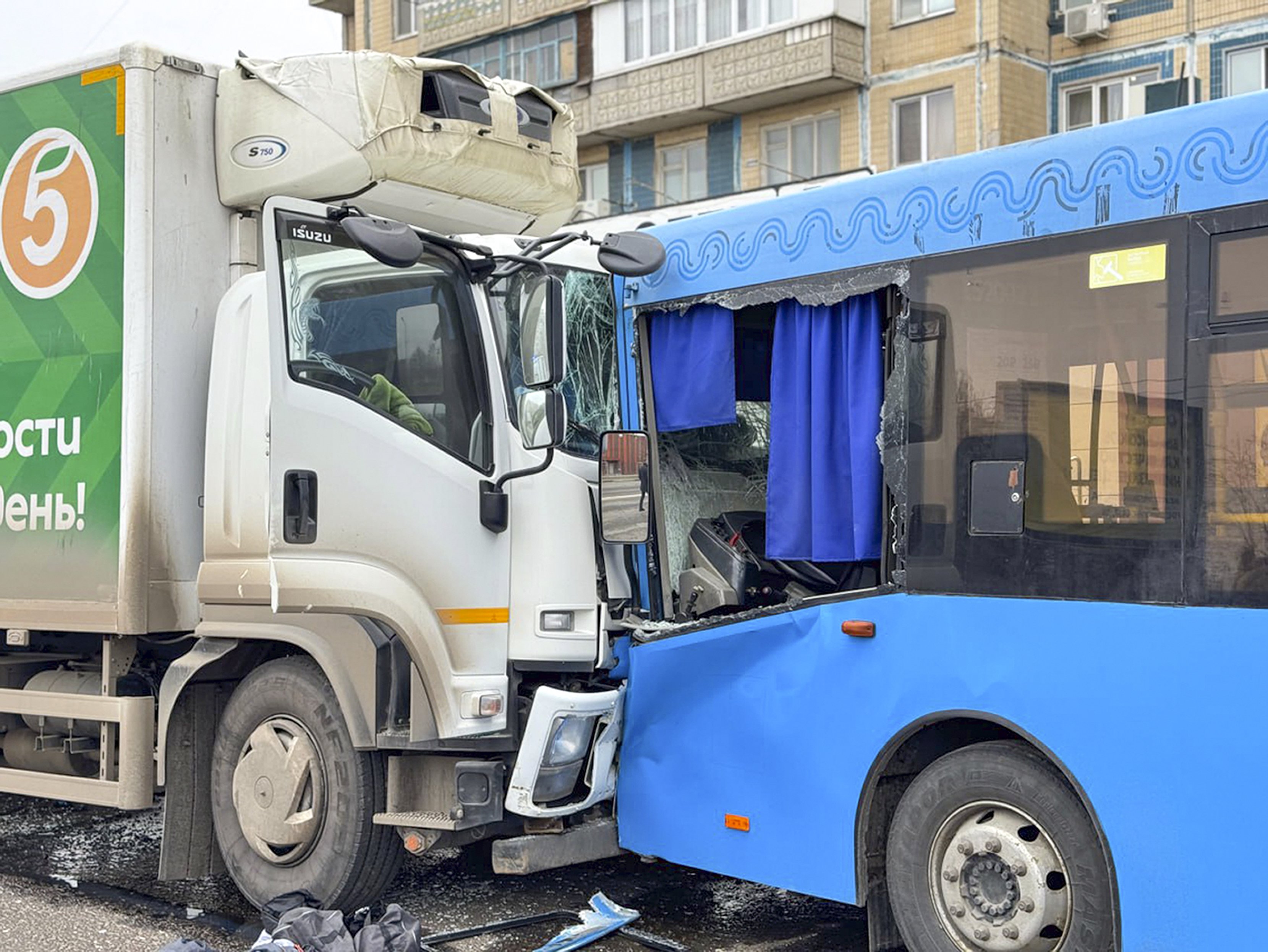 A broken truck and a bus after shelling from the Ukrainian side in Belgorod, Russia. Photo / Belgorod region governor Vyacheslav Gladkov telegram channel via AP