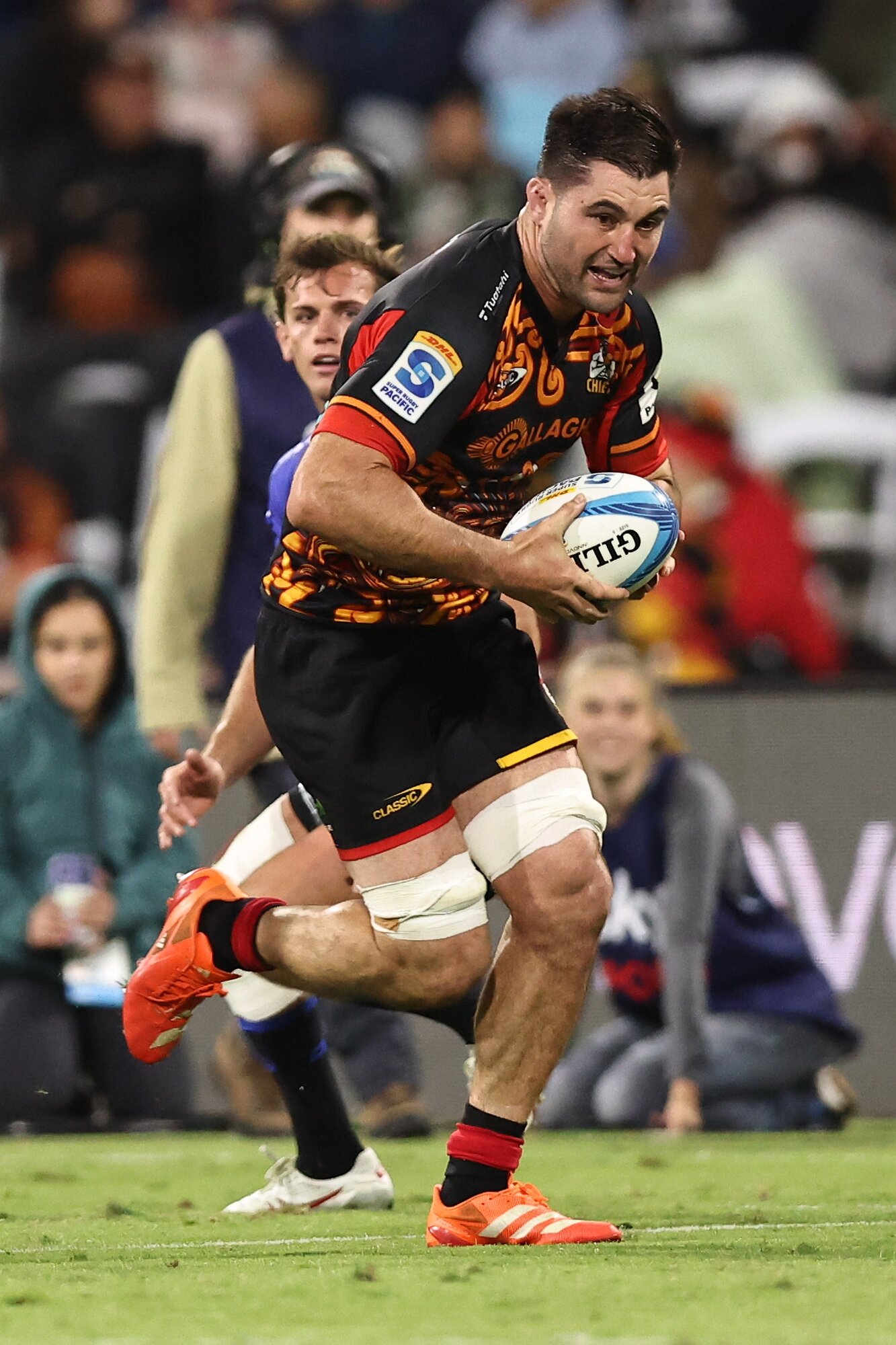 Chiefs loosie Luke Jacobson charges on against the Western Force. Photo / SmartFrame