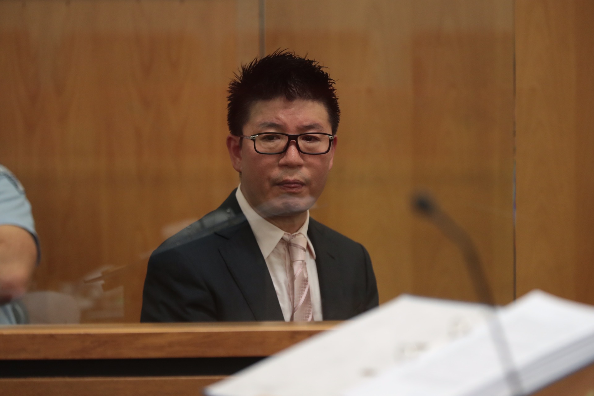 William Yan in the dock at the Auckland District Court for sentencing on money laundering. Photo / Brett Phibbs