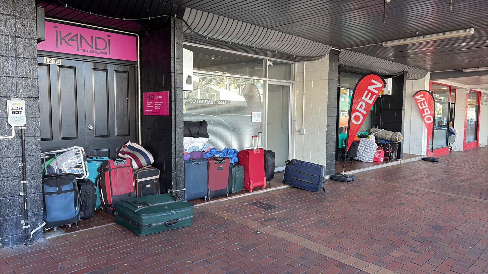 Suitcases stacked up outside Pukuatua St businesses. Photo / Supplied