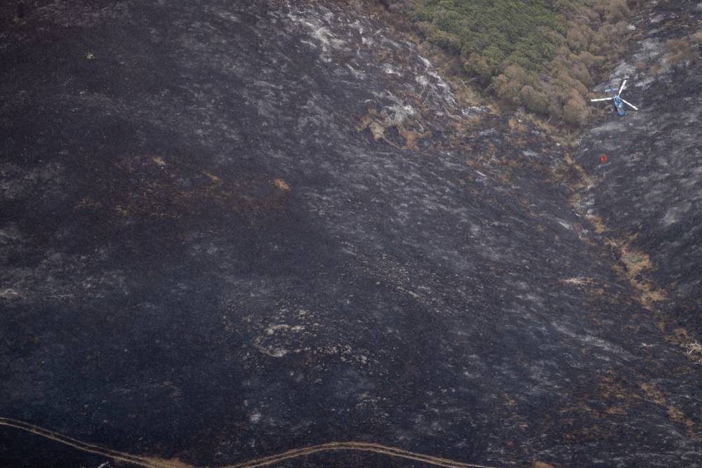 Aerial view of the Port Hills fire devastation as emergency services continue to battle the uncontrolled blaze. Photo / George Heard