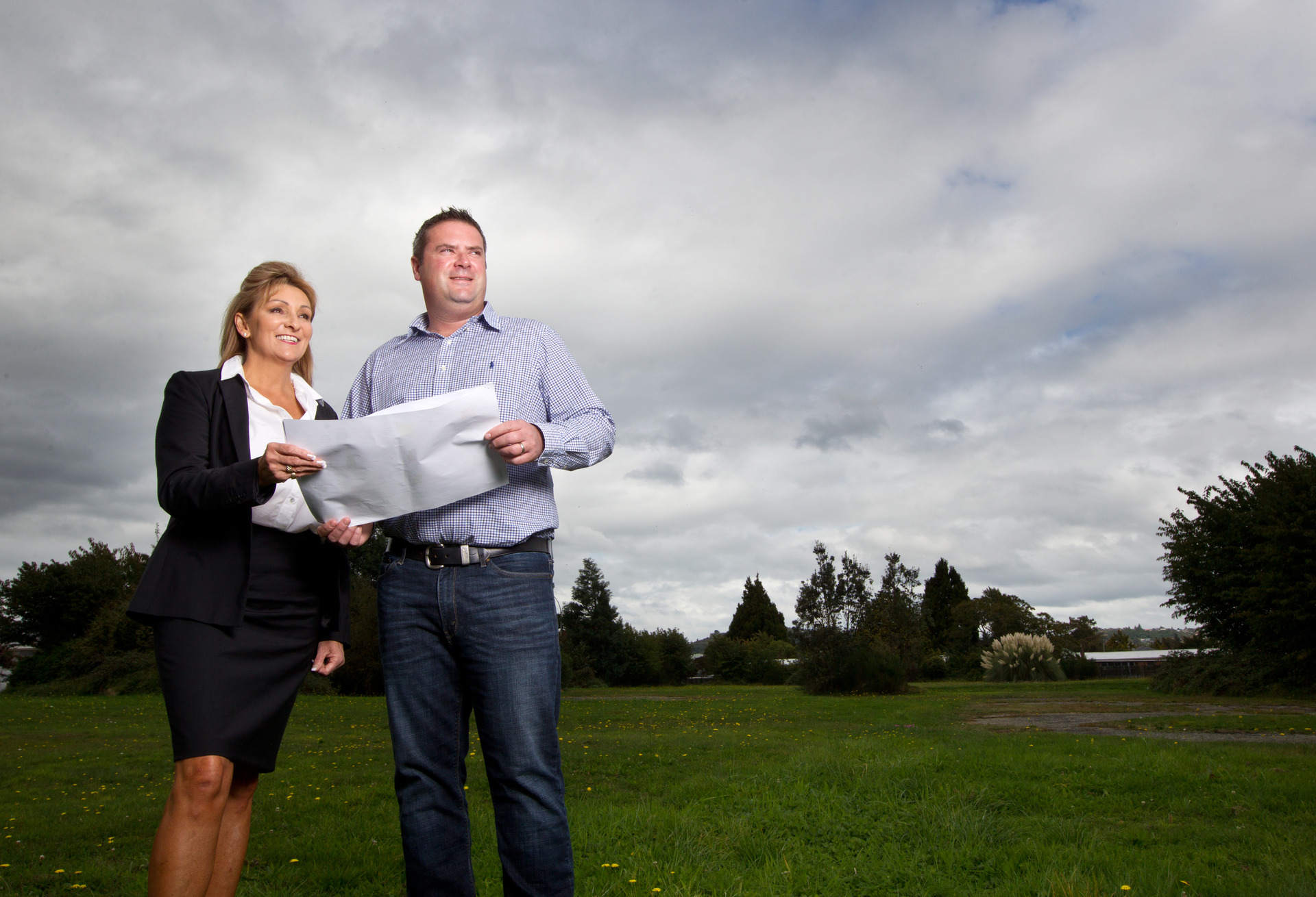 Beth Millard from Bayleys and Holmes Group's Ryan Holmes at the site they were to turn into Ashworth Villas in 2018. Photo / File 