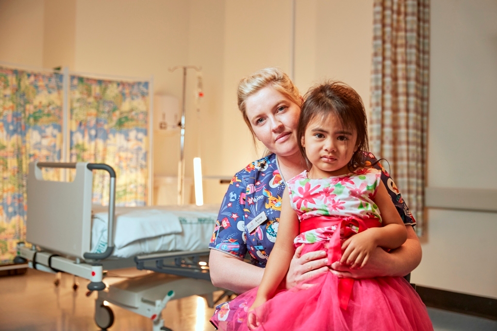 Starship patient Talo with Paediatric Intensive Care Unit nurse Aisling Fallon. Photo / Supplied