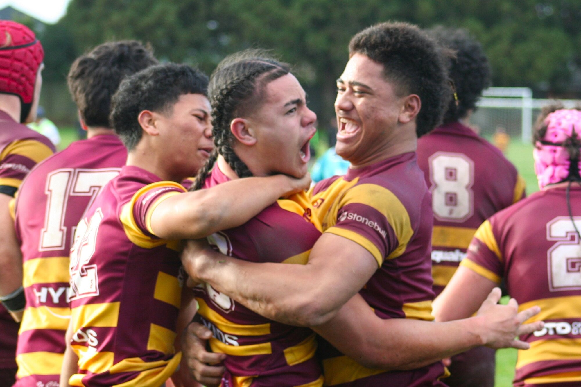 Liston sub Josiah Fuaaletoelau is congratulated by teammates after scoring the winning try against King's College. Photo / Bruce Holloway
