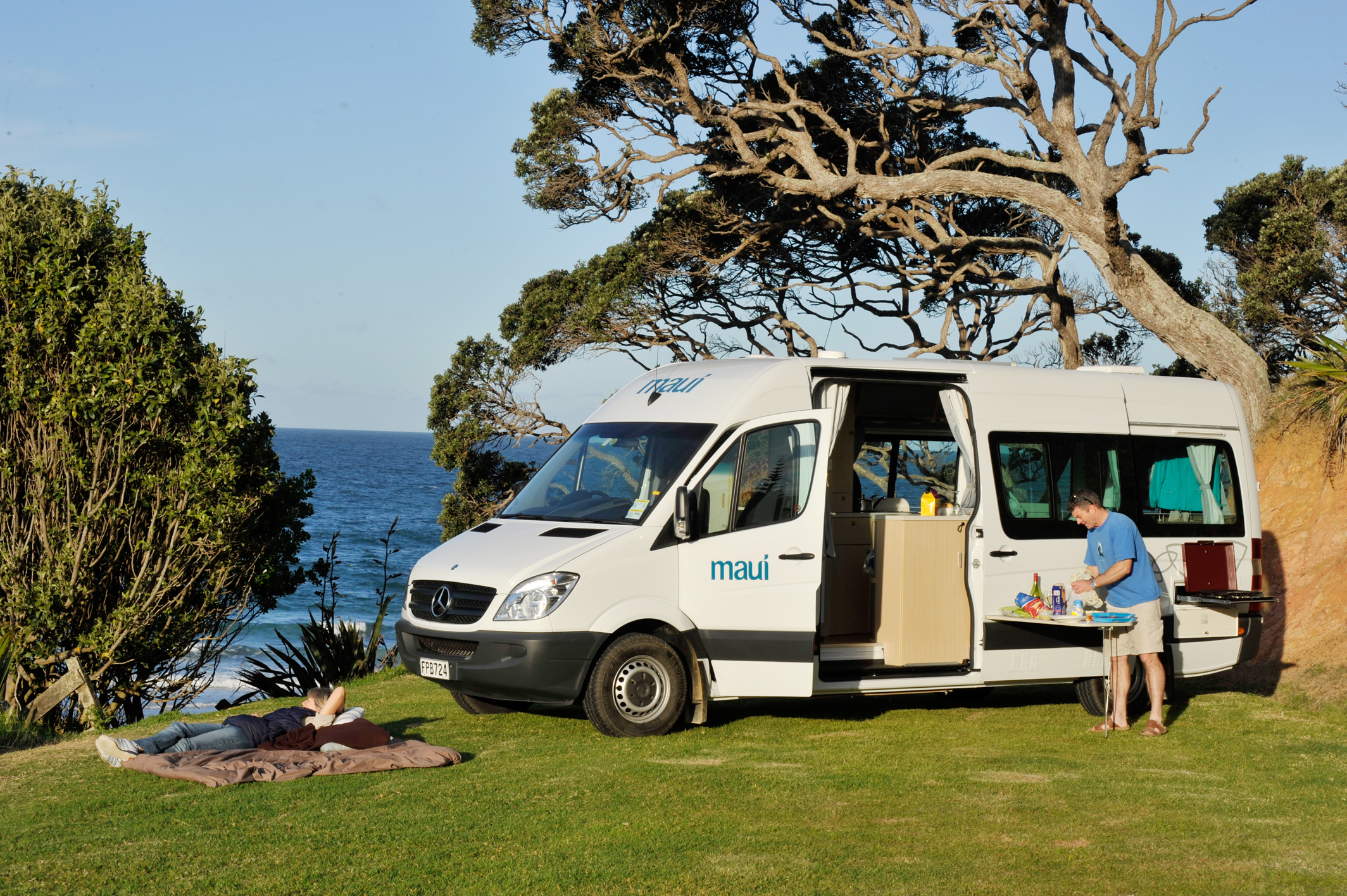 Freedom campers love Northland, which some years hosts up to a third of all international campervan tourists to New Zealand. How will the council pay to keep these visitors in check if government funding dries up? Photo / Supplied