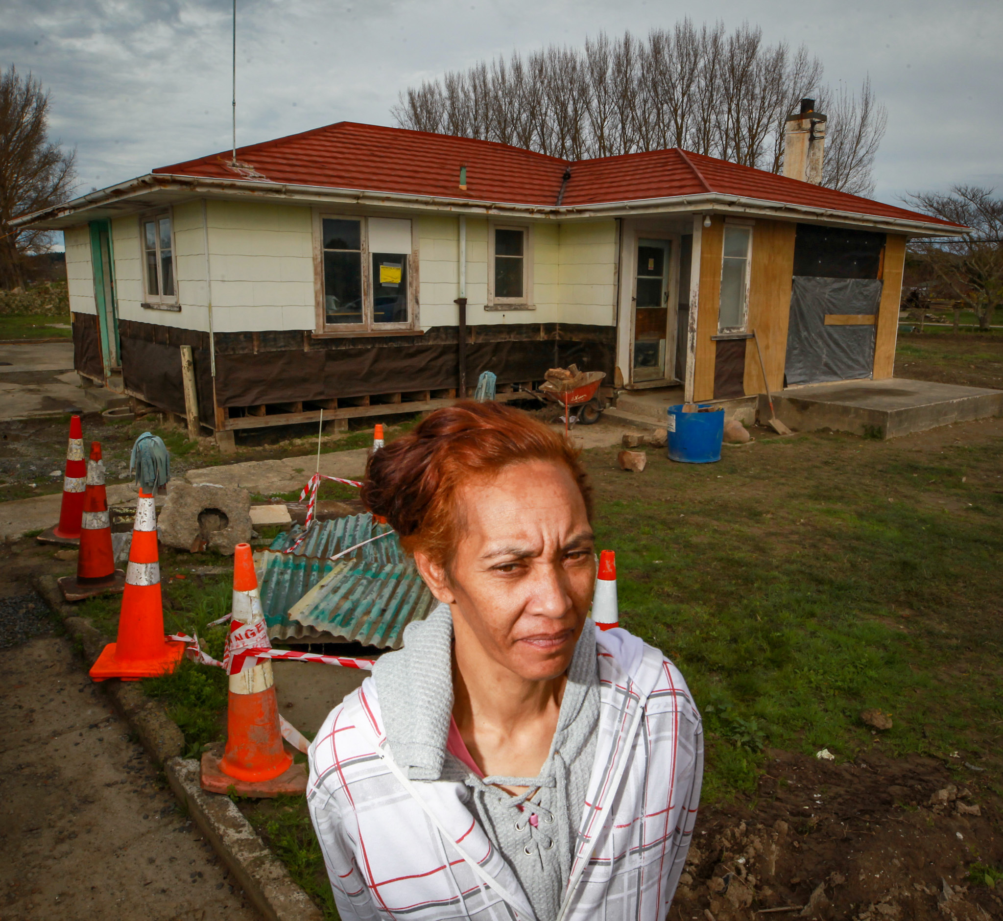 Terina Henare was uninsured when a wall of muddy water pushed into it. She and her partner and dad have since made piecemeal renovations to try to get it dry again. Photo / Paul Taylor