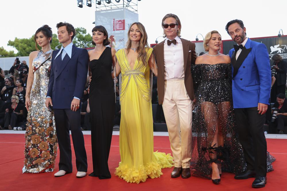 The cast of Don't Worry Darling (L-R): Gemma Chan, Harry Styles, Sydney Chandler, director Olivia Wilde, Chris Pine, Florence Pugh and Nick Kroll. Photo / AP