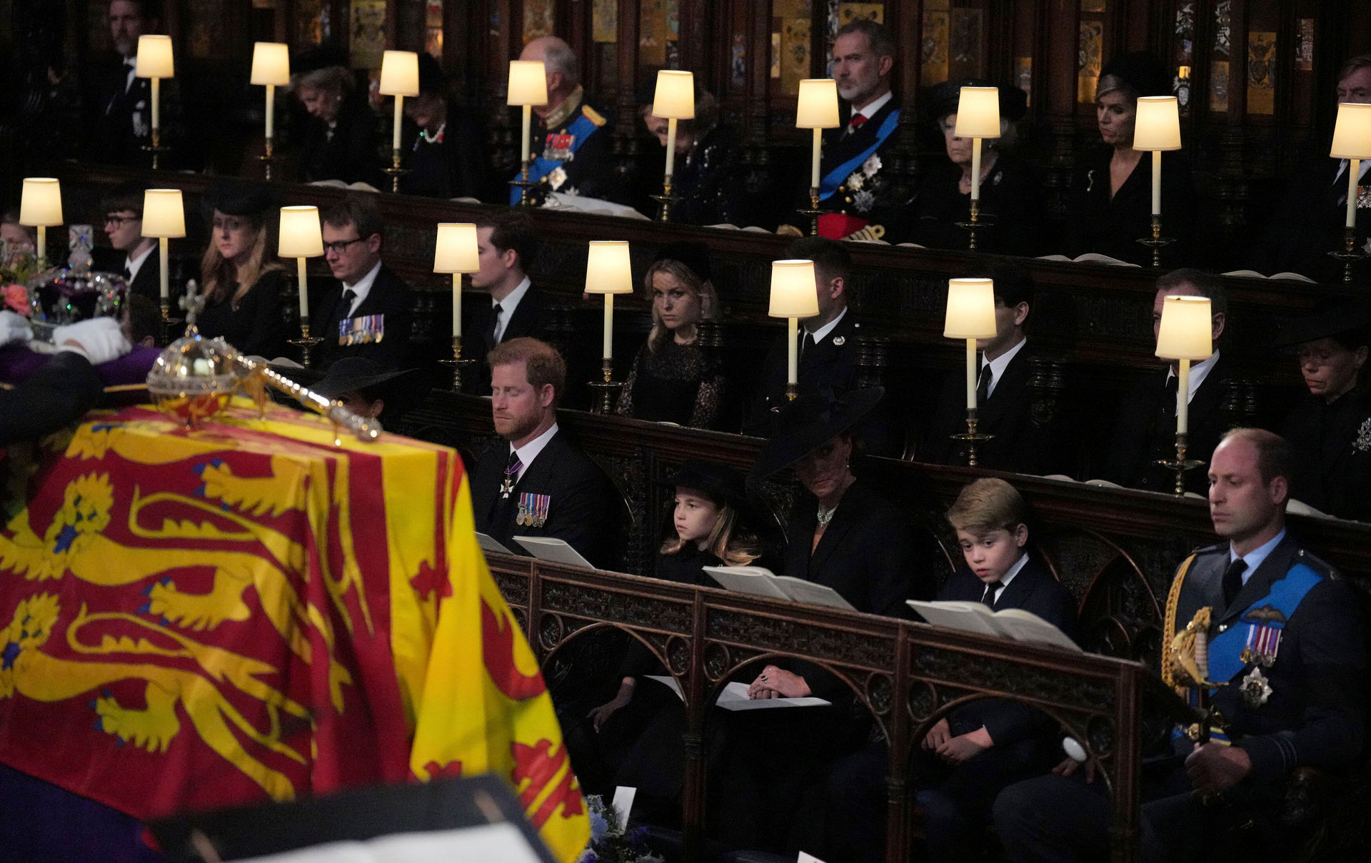 Prince Harry and other royals sit during the committal service for Queen Elizabeth II. Photo / AP