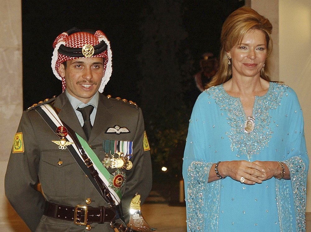 Jordan's Prince Hamza left, with his mother Queen Noor, right, stand during his wedding ceremony. Photo / AP