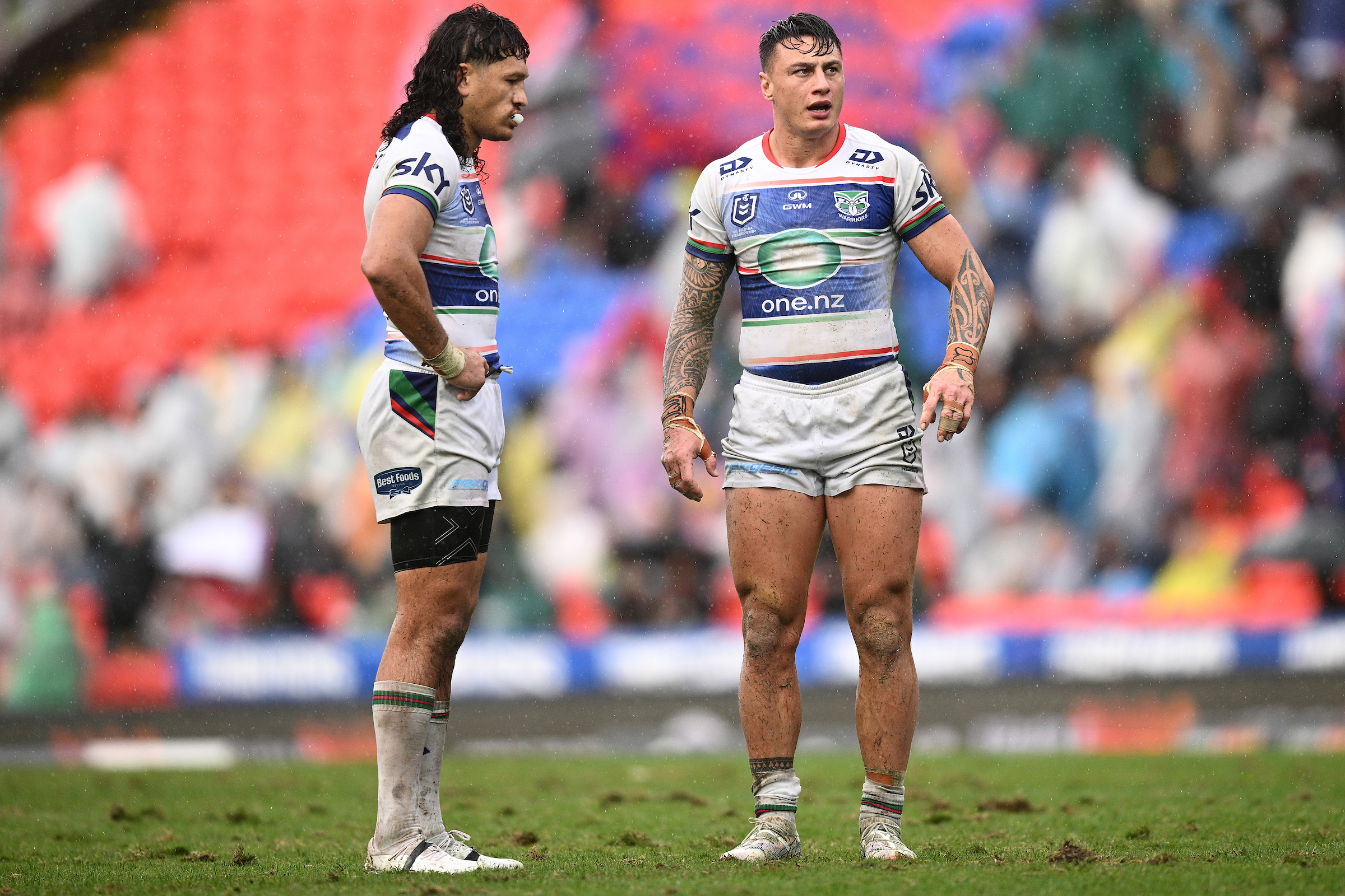 Dallin Watene-Zelezniak and Charnze Nicoll-Klokstad show their disappointment after the loss to the Newcastle Knights. Photo / Photosport