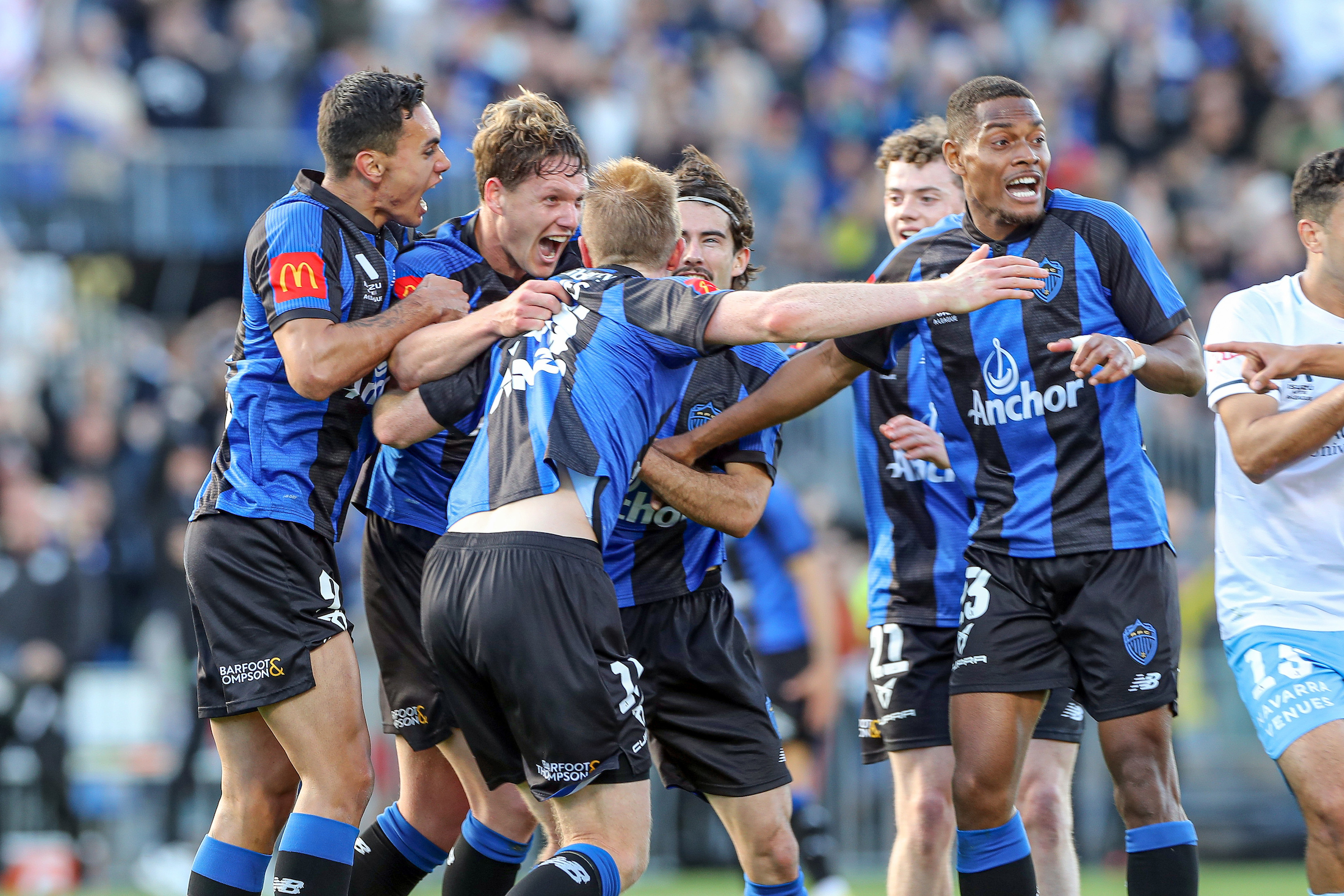 Auckland FC's Nando Pijnaker (second left) celebrates after scoring a late winner against Sydney FC. Photo / Photosport
