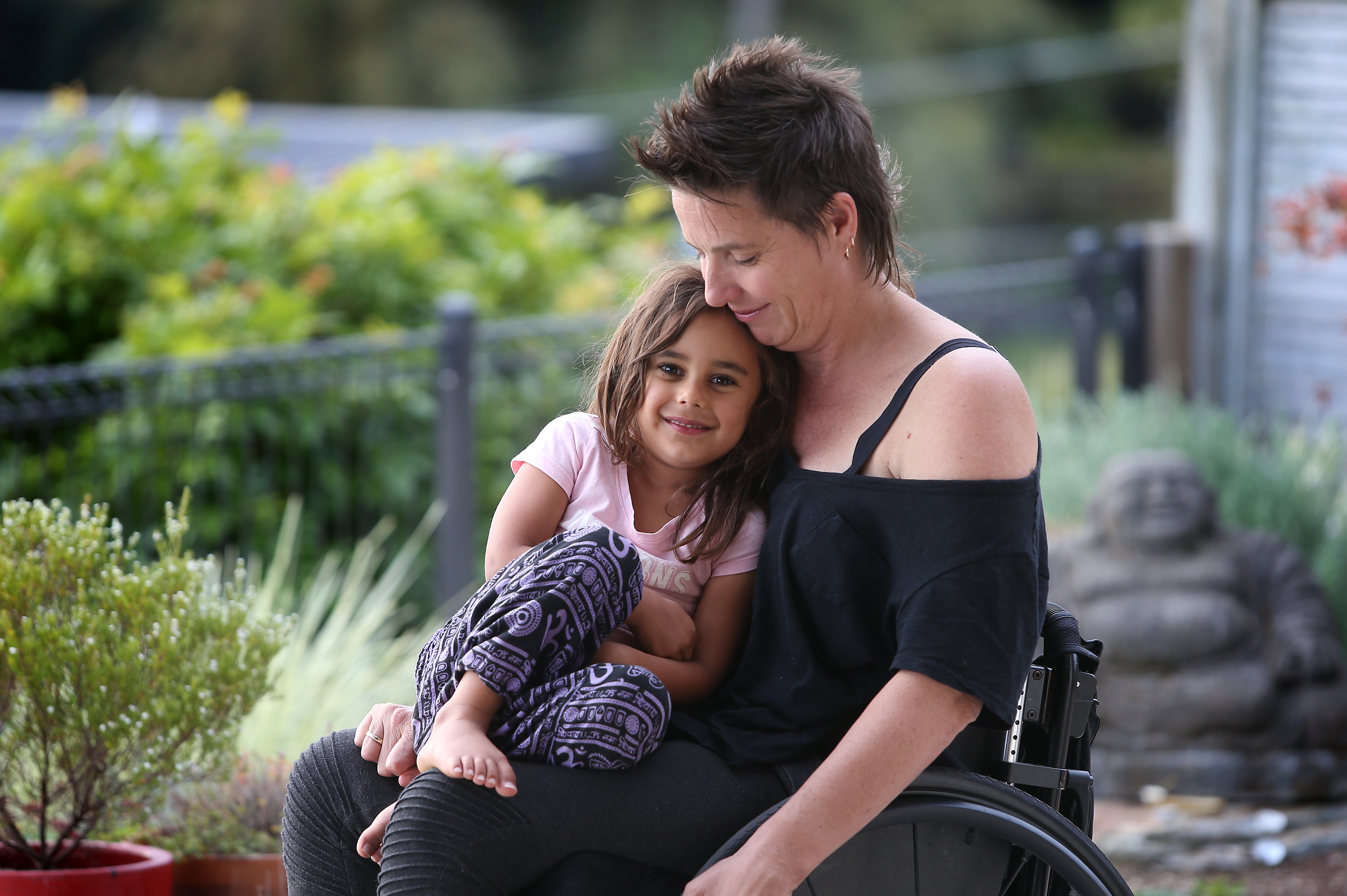 Five years on from her accident, Lowry, pictured here with Ziggy, says of her family: