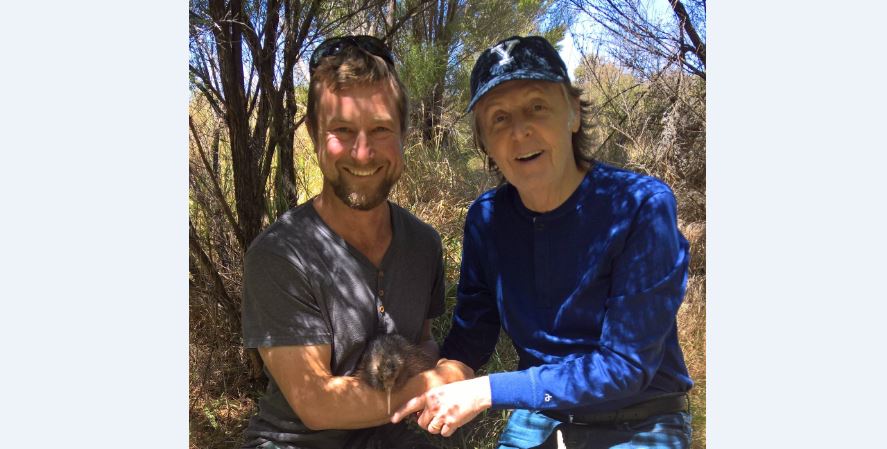 Cape Sanctuary manager Beau Fahnle, Sir Paul McCartney and Bubbalicious, who has been released back into the wild. Photo/Supplied
