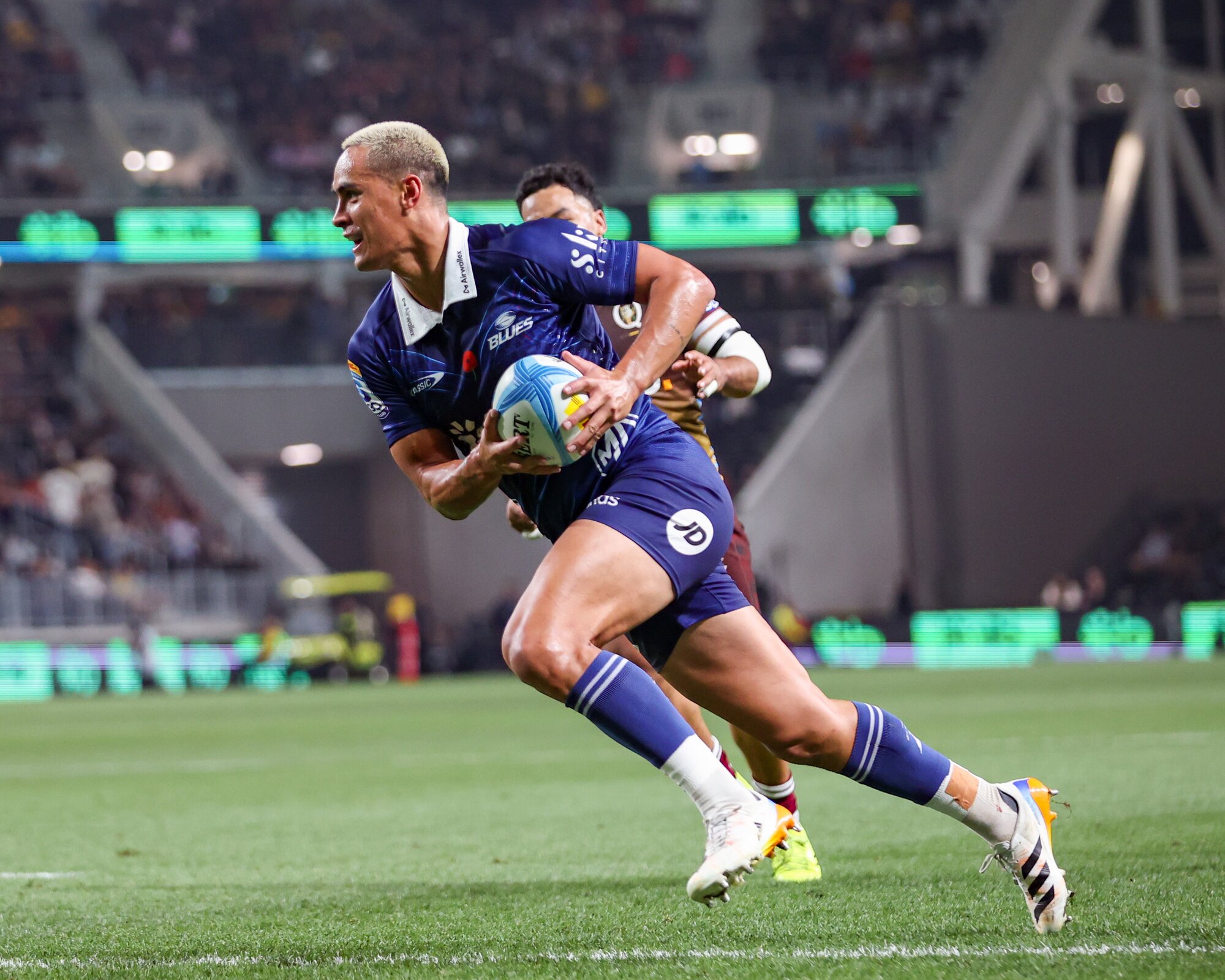 Blues fullback Zarn Sullivan crosses the line against the Reds. Photo / SmartFrame