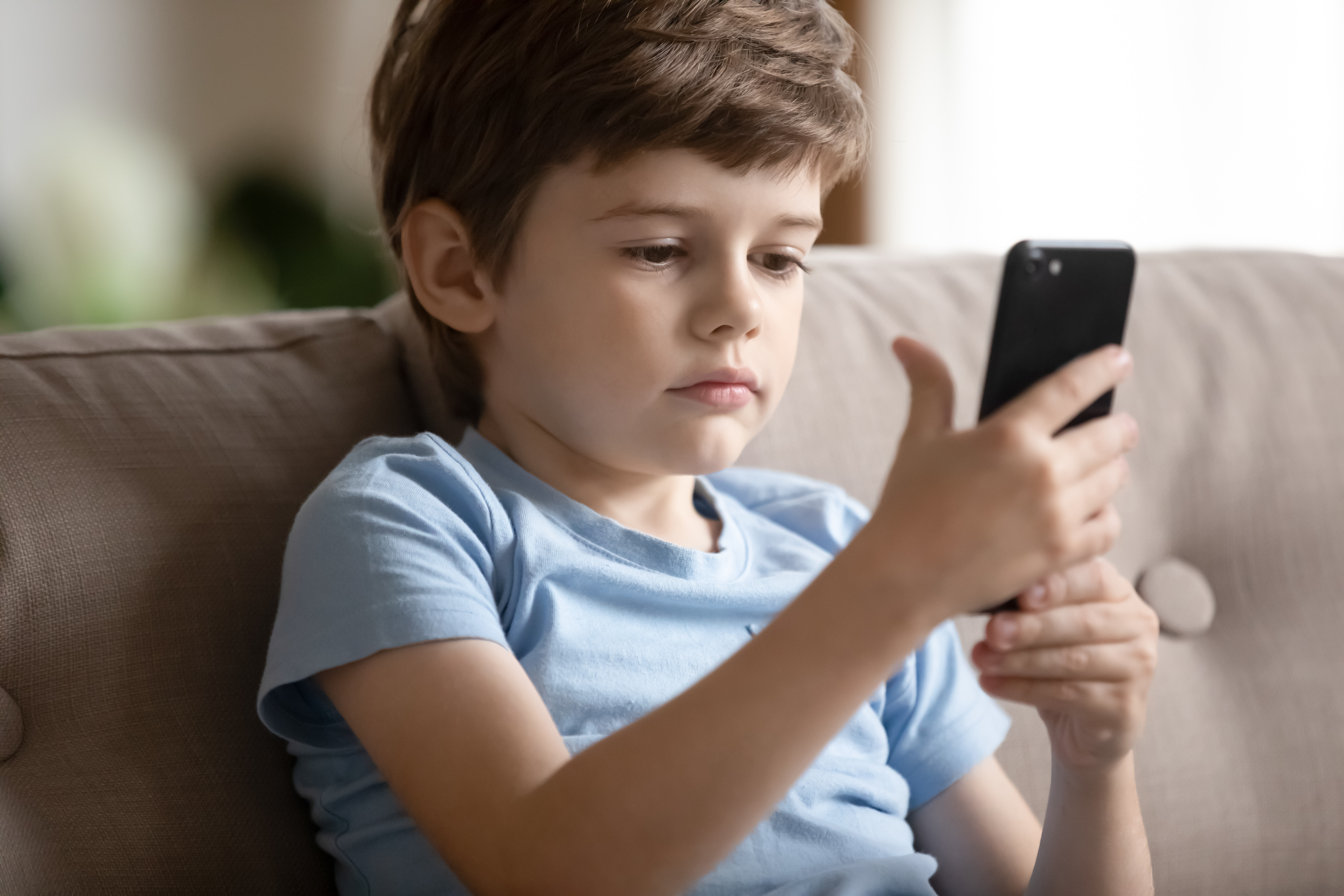 Social media use starts early. But how much should you intervene if your child shows signs of addiction? Photo / 123rf