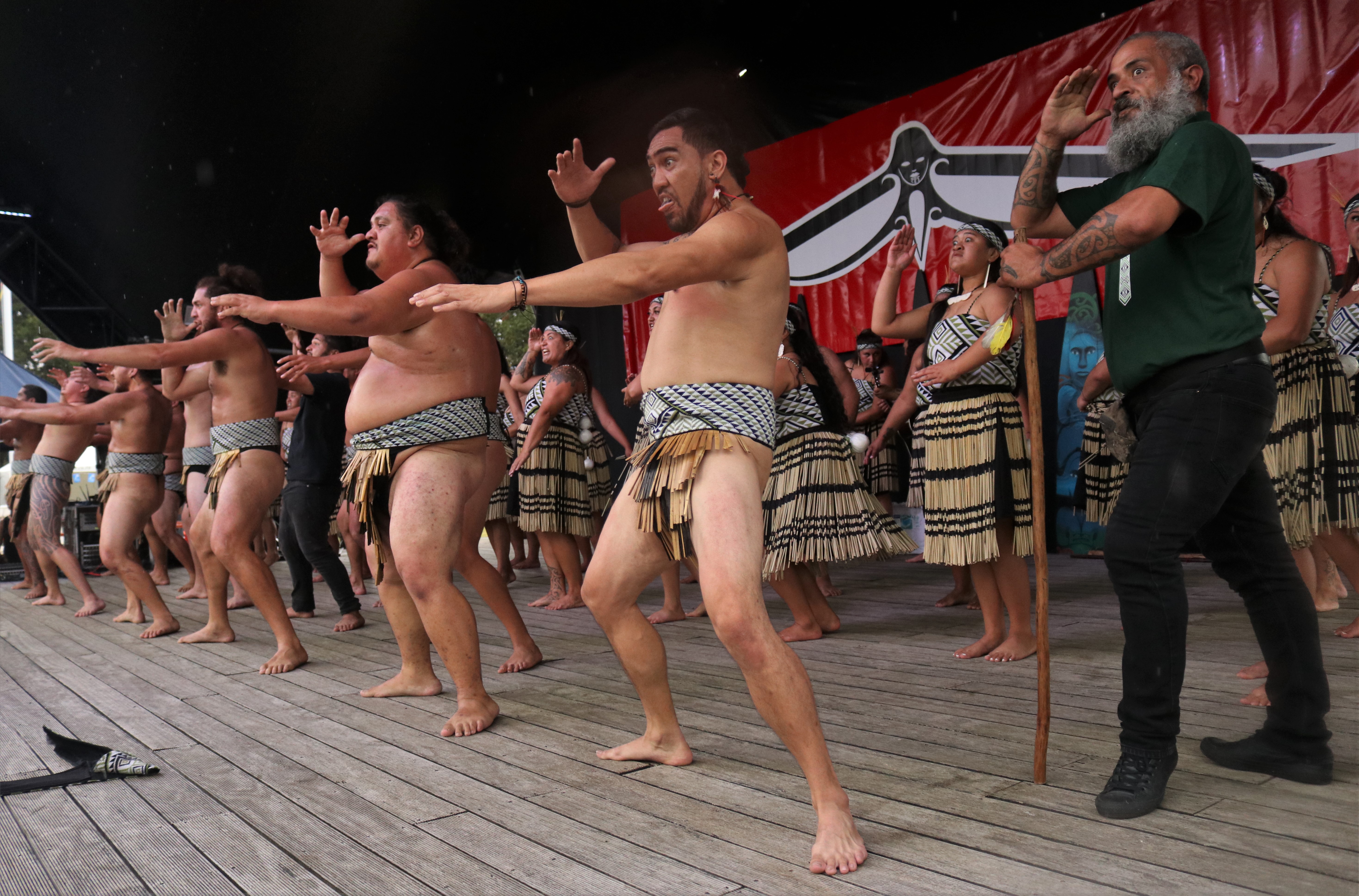 Tutor Tātai Henare (right) guides members of kapa haka group Waerenga Te Kaha as they perform at Te Āhuareka. Photo / Peter de Graaf