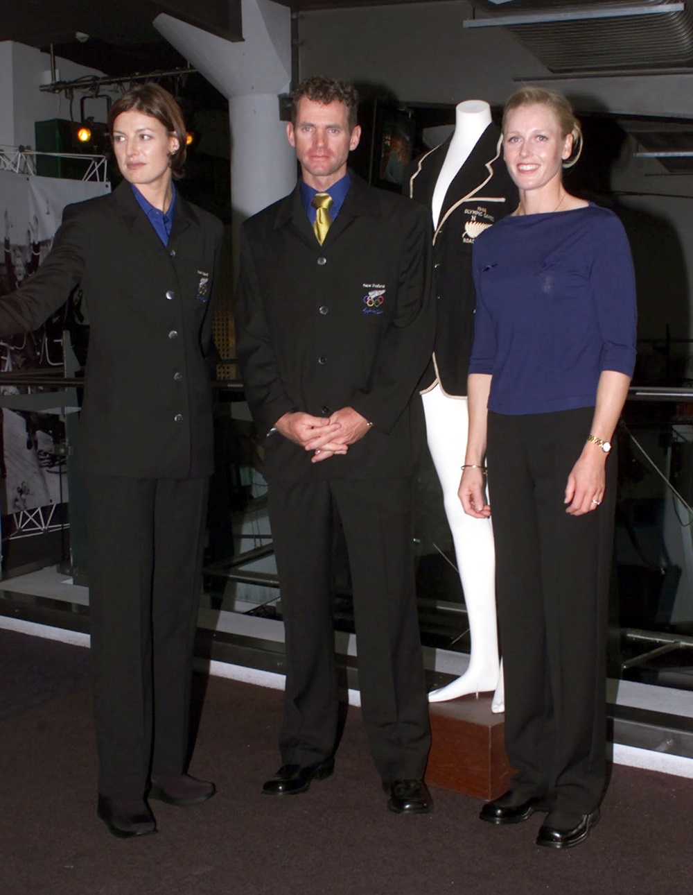 The uniform launch for the New Zealand team for the 2000 Sydney Olympics. Pictured modelling the formal wear are Toni Hodgkinson (left) and Gary Anderson, while the travelling uniform is modelled by Sonia Waddell. Photo / Getty Images