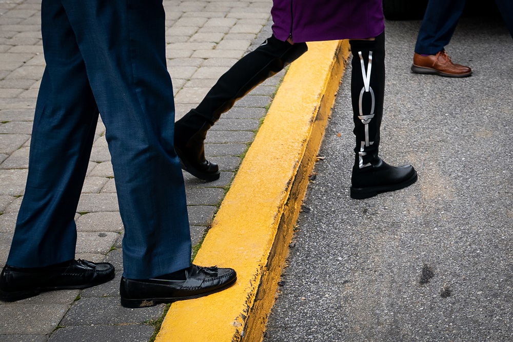 First Lady Jill Biden wears a pair of Stuart Weitzman knee-high boots displaying the word Vote to cast her ballot in Delaware's state primary election, in Wilmington. Photo / New York Times