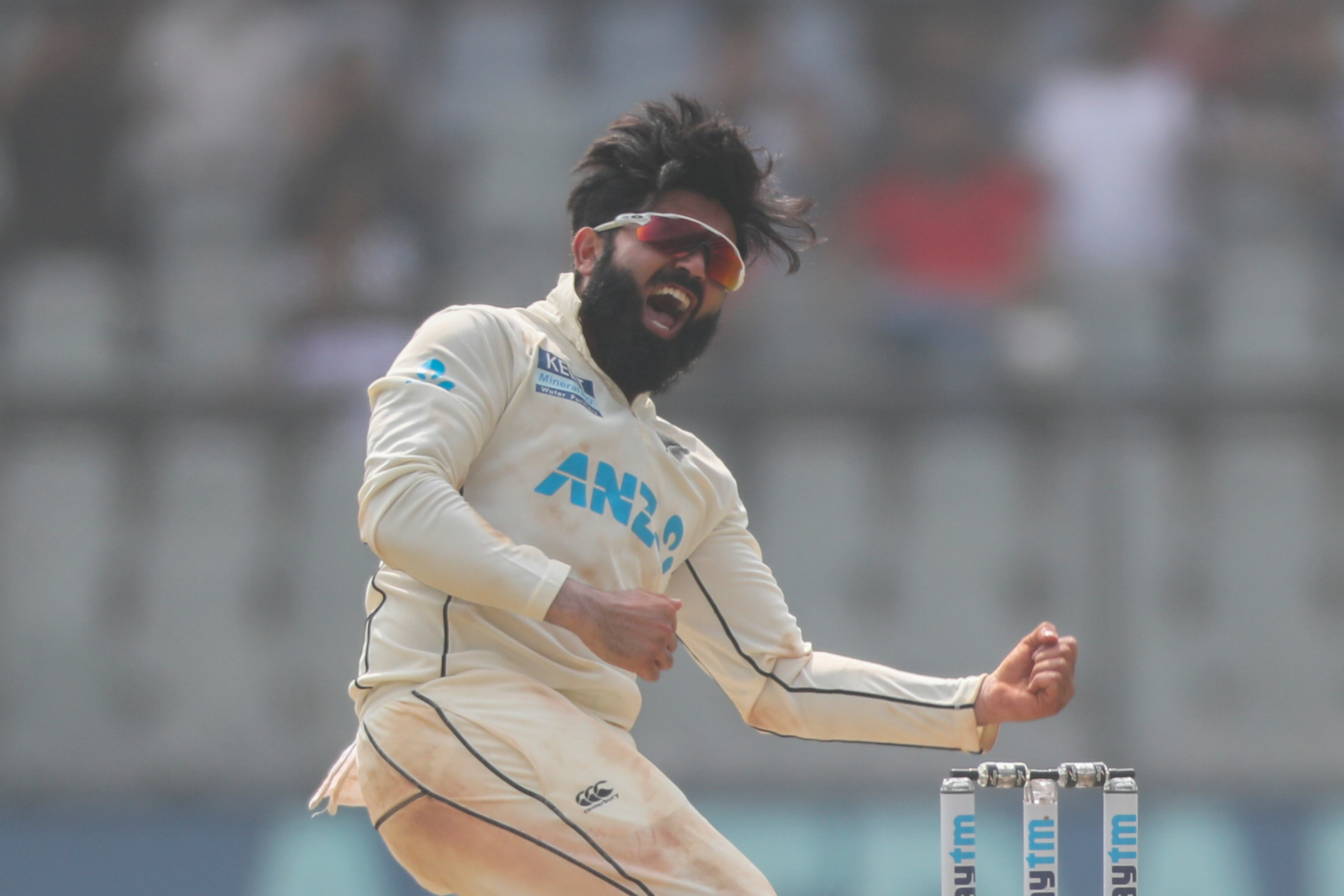 New Zealand's Ajaz Patel celebrates the dismissal of India's Mohammed Siraj to claim his 10th wicket. Photo / AP