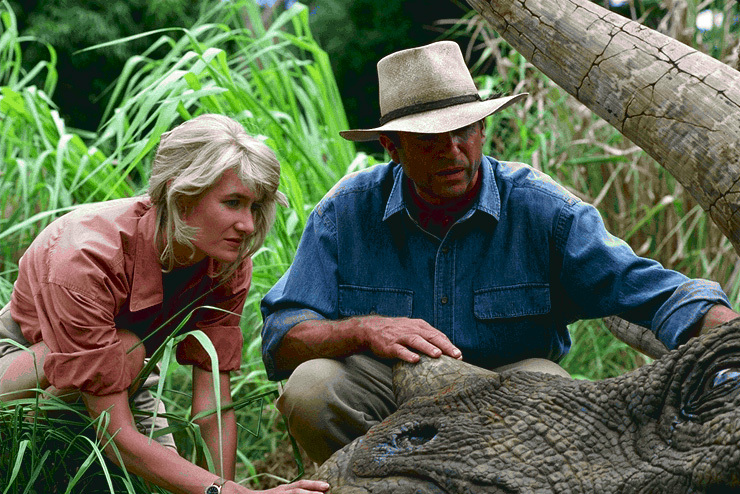 Sam Neill and Laura Dern in Jurassic Park, the first film in the eventual six-film Jurassic Park franchise.
