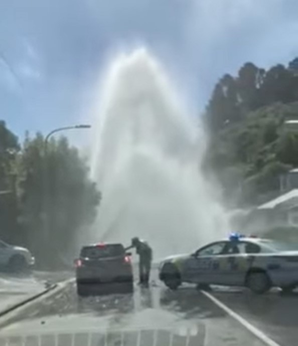 Police warn motorists about the burst wastewater pipe. 