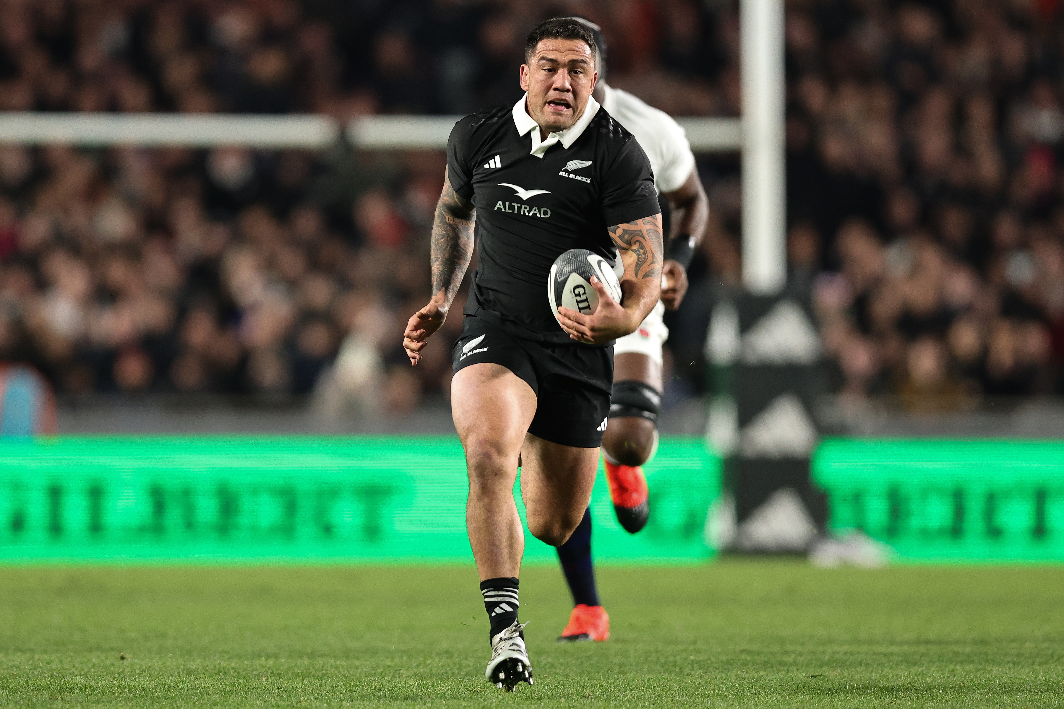 Codie Taylor on the charge for the All Blacks against England. Photo / Photosport