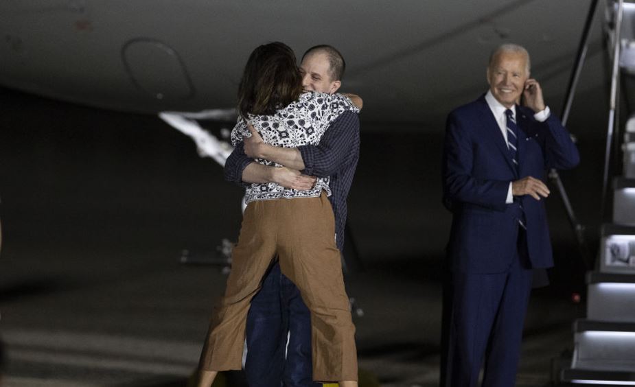 Evan Gershkovich's mother Ella Milman welcomes her son as he has returned to the US as part of a successful prisoner exchange. Photo / Getty Images