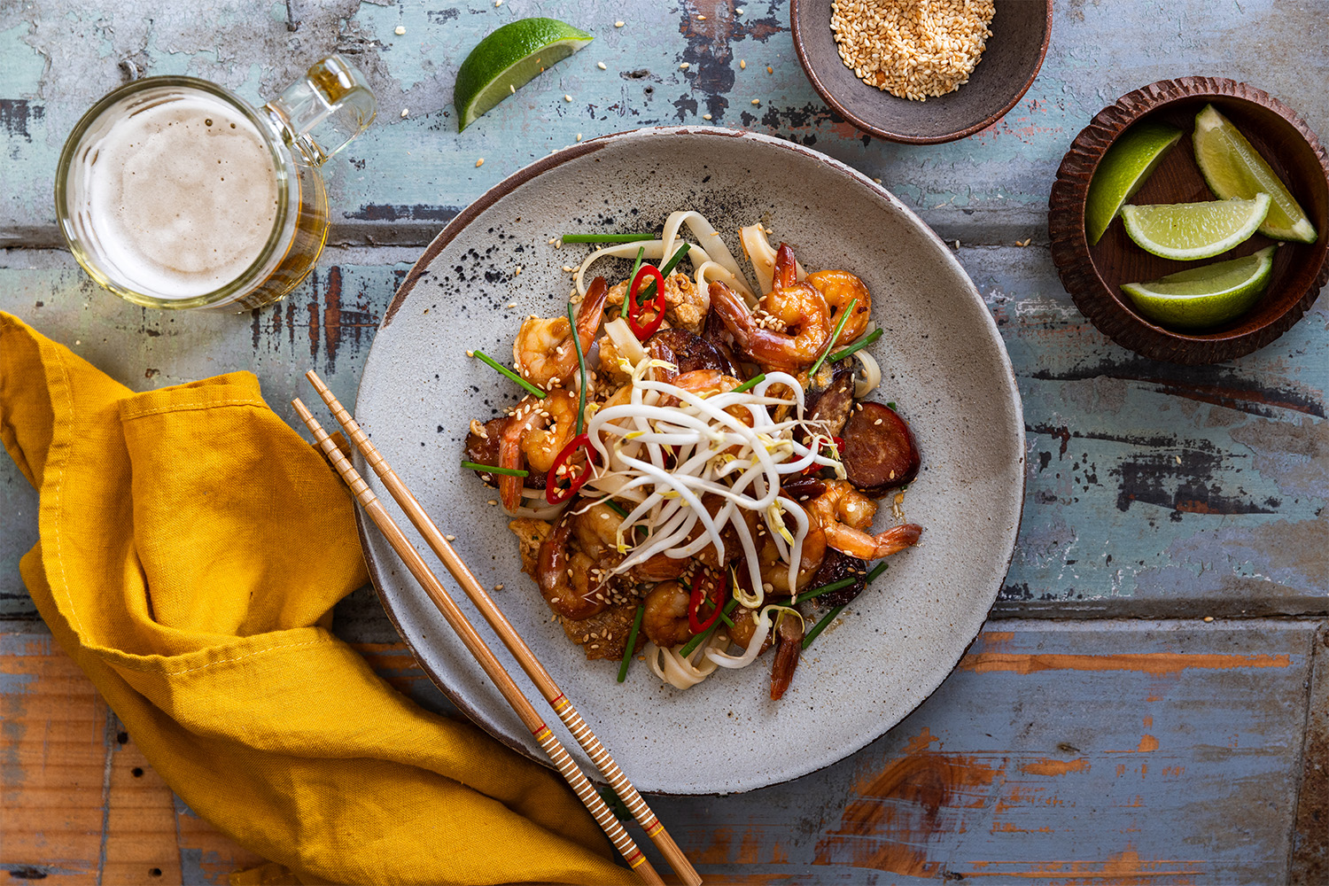 Toasted sesame seeds add crunch and warmth to this saucy noodle dish. Photo / Babiche Martens