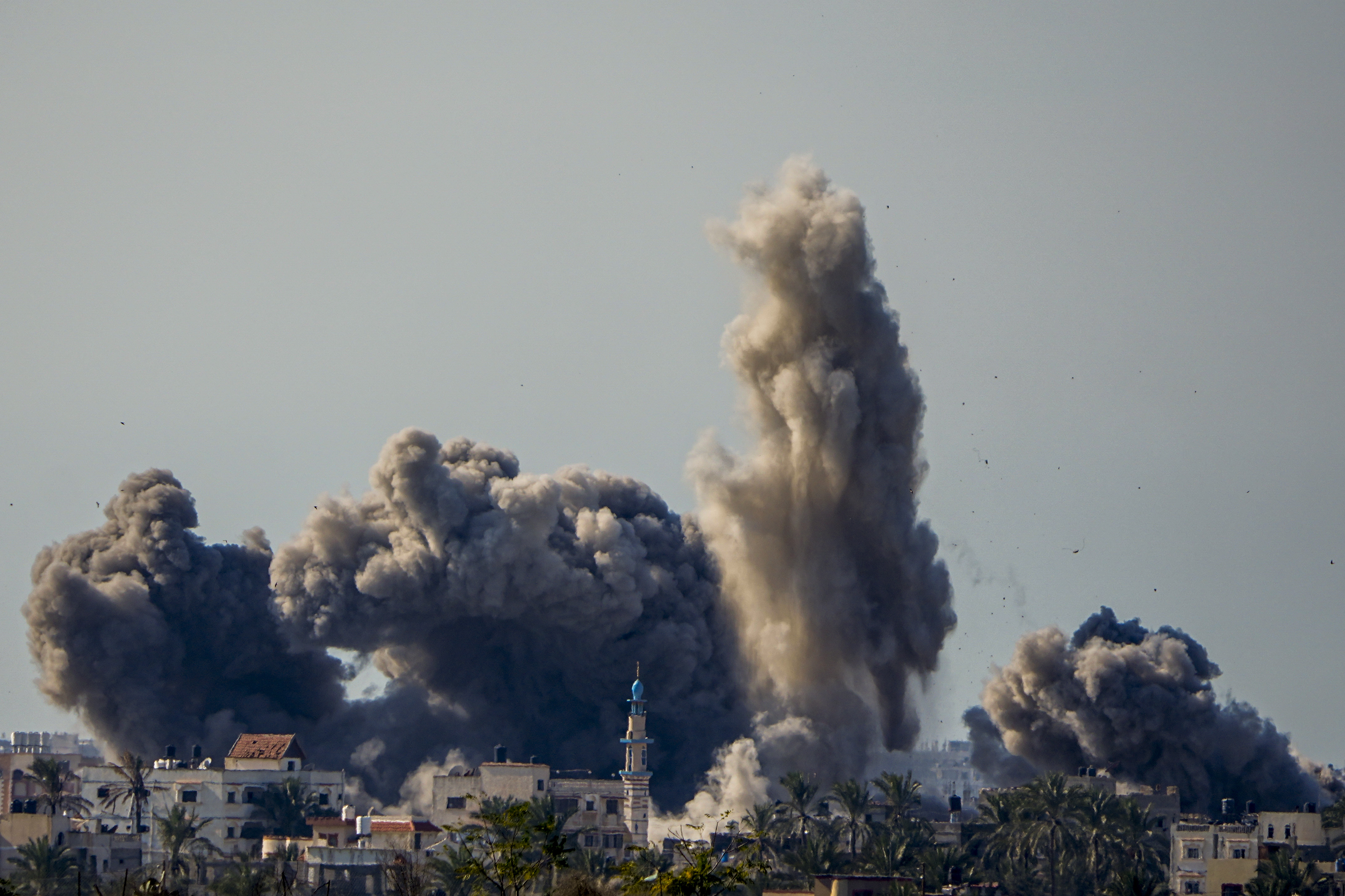Smoke and explosion following an Israeli bombardment inside the Gaza Strip, as seen from southern Israel, Sunday, February 11. The army is battling Palestinian militants across Gaza in the war ignited by Hamas' October 7, 2023 attack into Israel. Photo / Ariel Schalit, AP