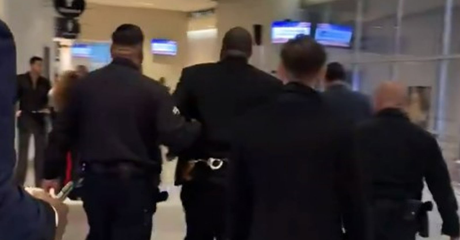 Killer Mike being escorted out of the Grammy Awards by police after winning three awards. Photo / X @thehollywoodreporter